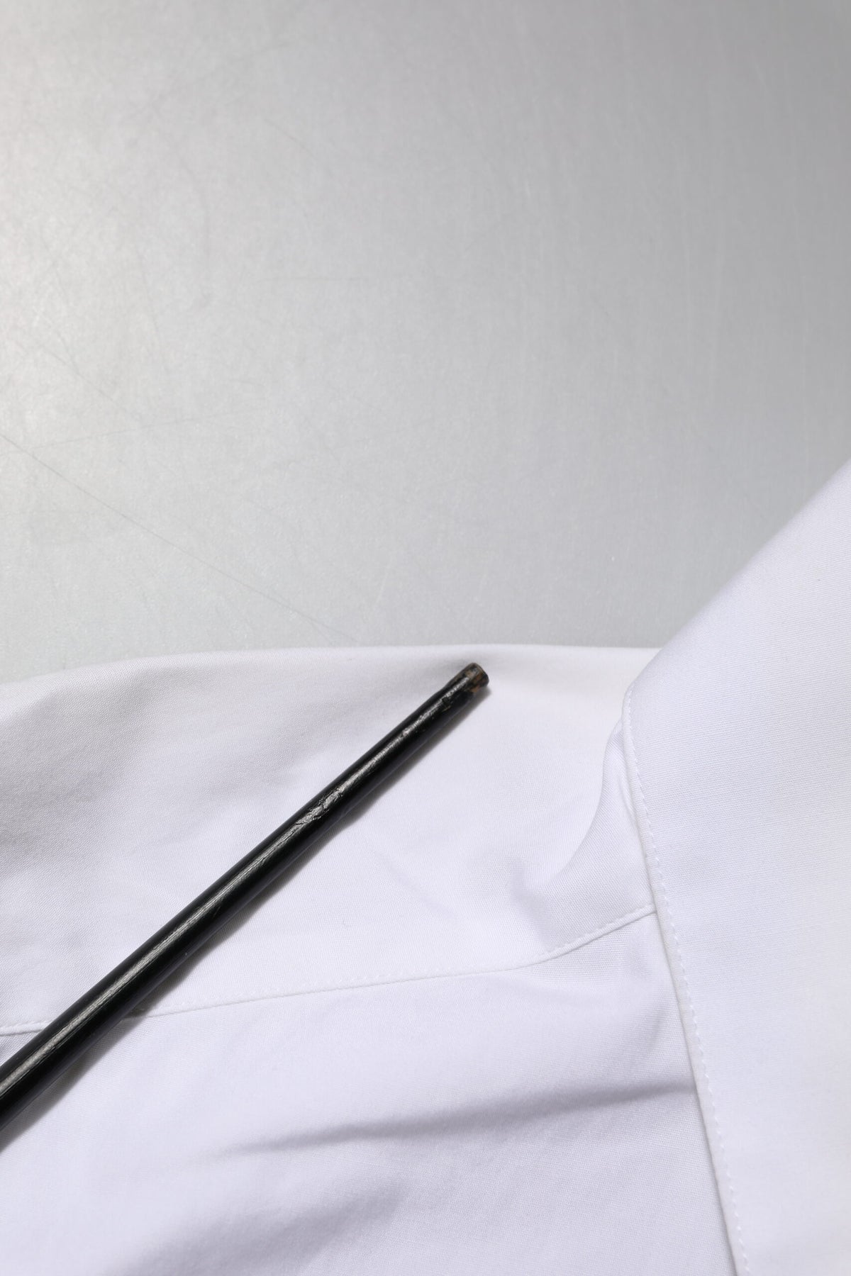 Elevate your wardrobe with the Dolce & Gabbana White Crystal Embellished Collared Shirt Top, a masterpiece of Italian craftsmanship in luxurious cotton, perfect for refined elegance.