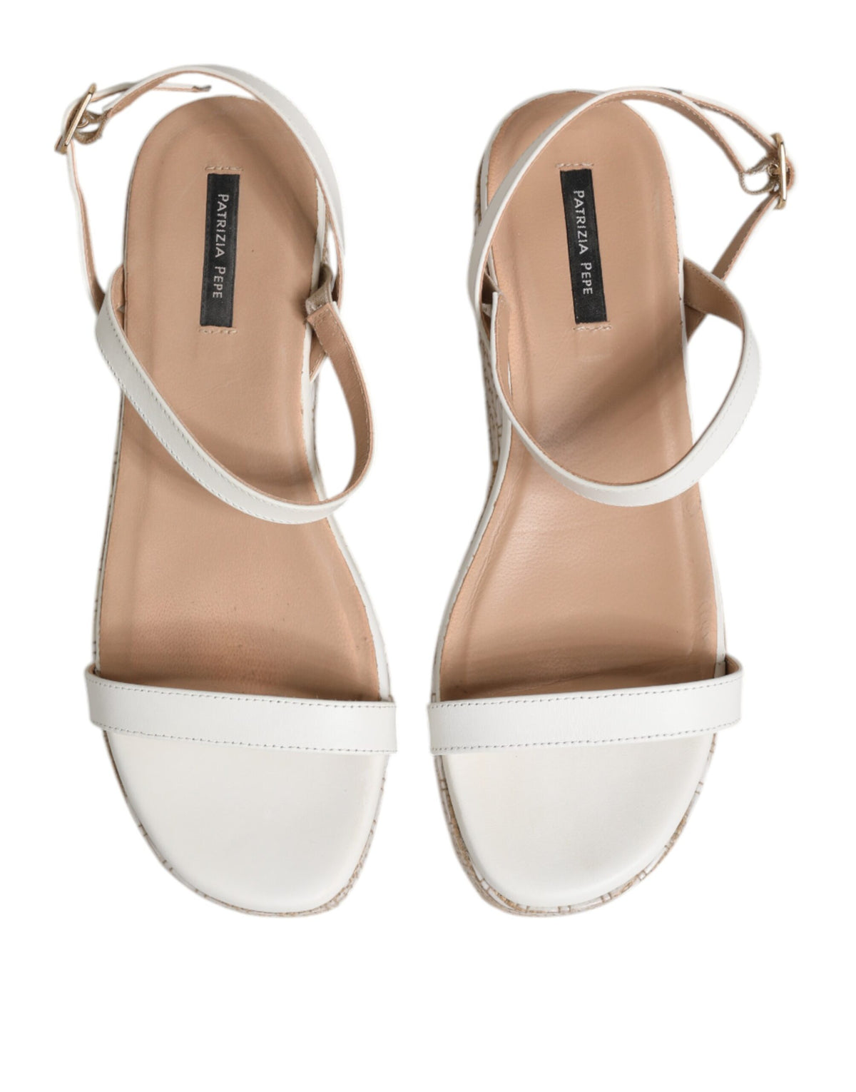 Step into the realm of refined elegance with Patrizia Pepe's White Espadrilles Ankle Strap Sandals, where artisanal leather craftsmanship meets timeless sophistication.