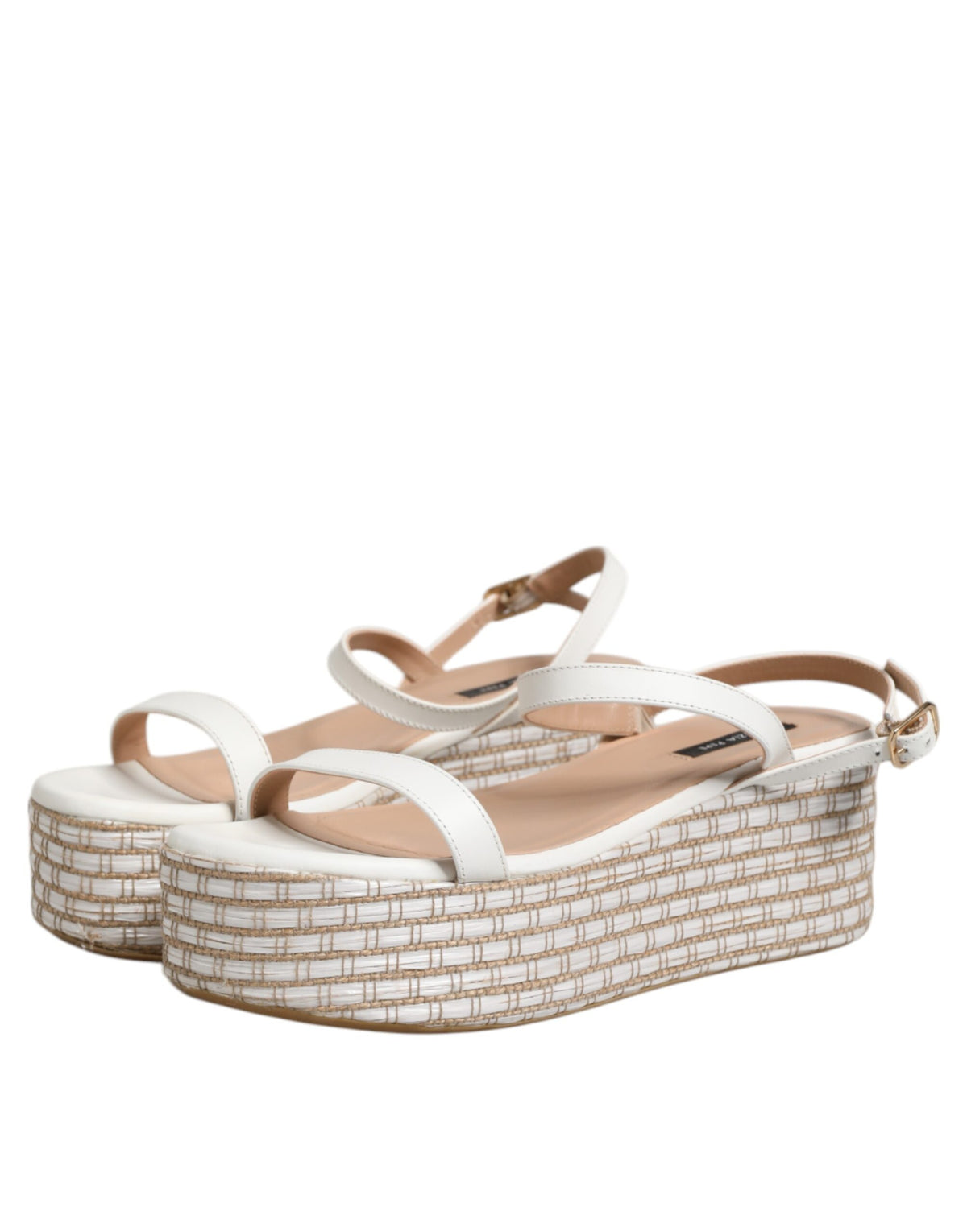Indulge in the artisanal luxury of Patrizia Pepe's White Espadrilles Ankle Strap Sandals, where exquisite leather meets timeless elegance, perfect for any discerning wardrobe.