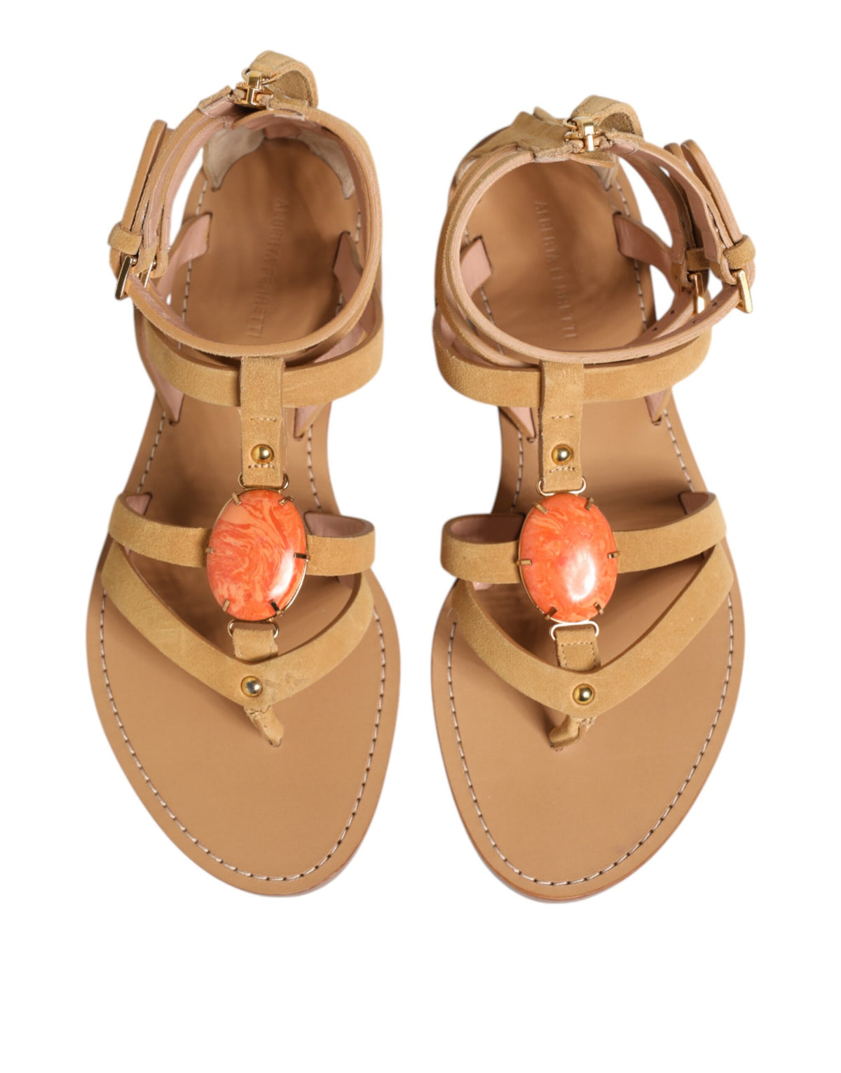 Discover Alberta Ferretti's Brown Flip Flops, where luxe leather meets exquisite design, embodying timeless elegance and unrivaled craftsmanship for the discerning individual.