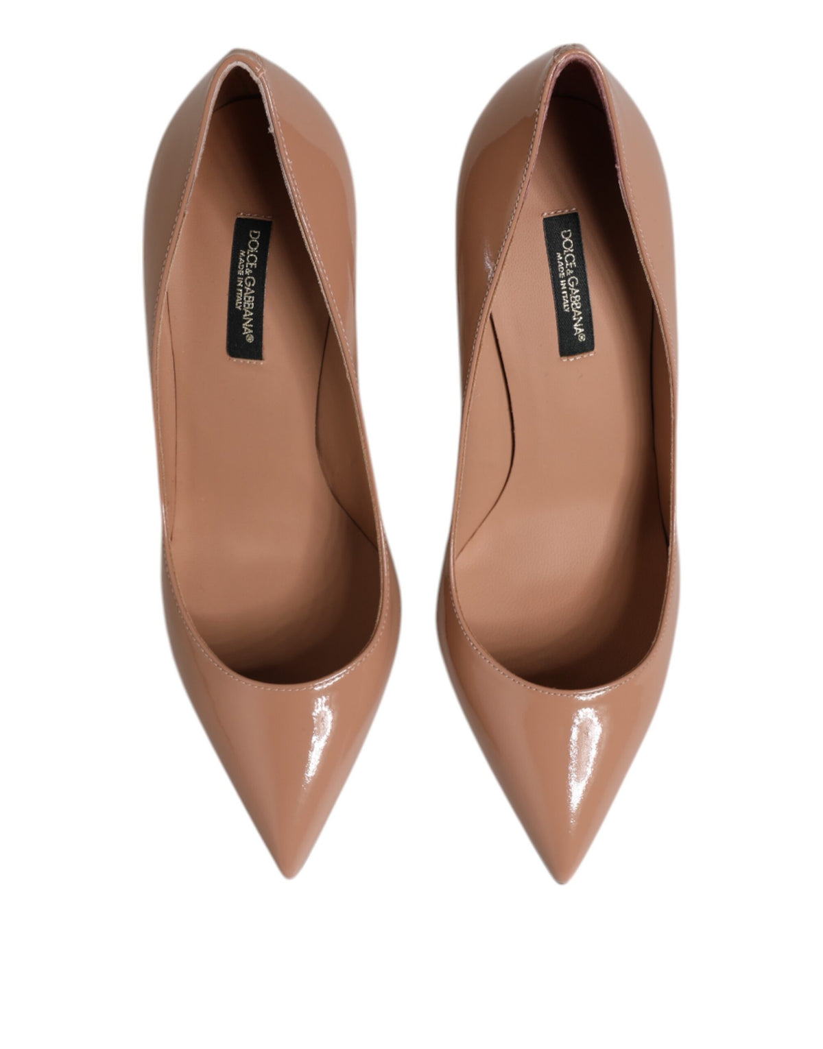 Experience the allure of Dolce & Gabbana's Beige Patent Leather Stiletto Heel Pumps, where exquisite craftsmanship meets timeless elegance, perfect for the discerning connoisseur.