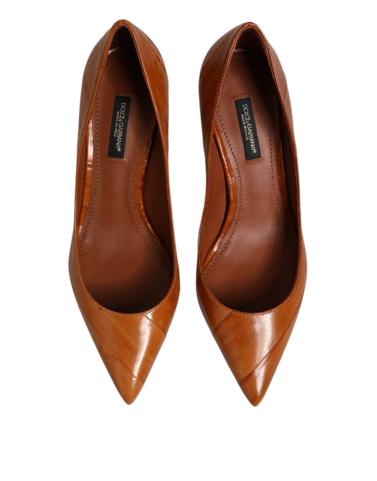 Elevate your elegance with Dolce & Gabbana's Brown Leather Stiletto Heel Pumps, where exquisite craftsmanship meets timeless allure, perfect for the discerning individual.