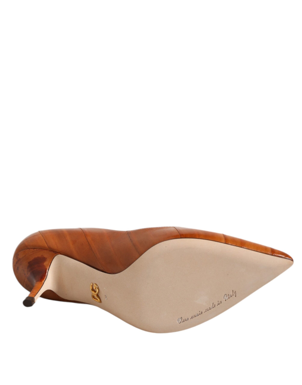 Indulge in the exquisite Dolce & Gabbana Brown Leather Stiletto Heel Pumps, where Italian craftsmanship meets timeless elegance, perfect for the discerning connoisseur.