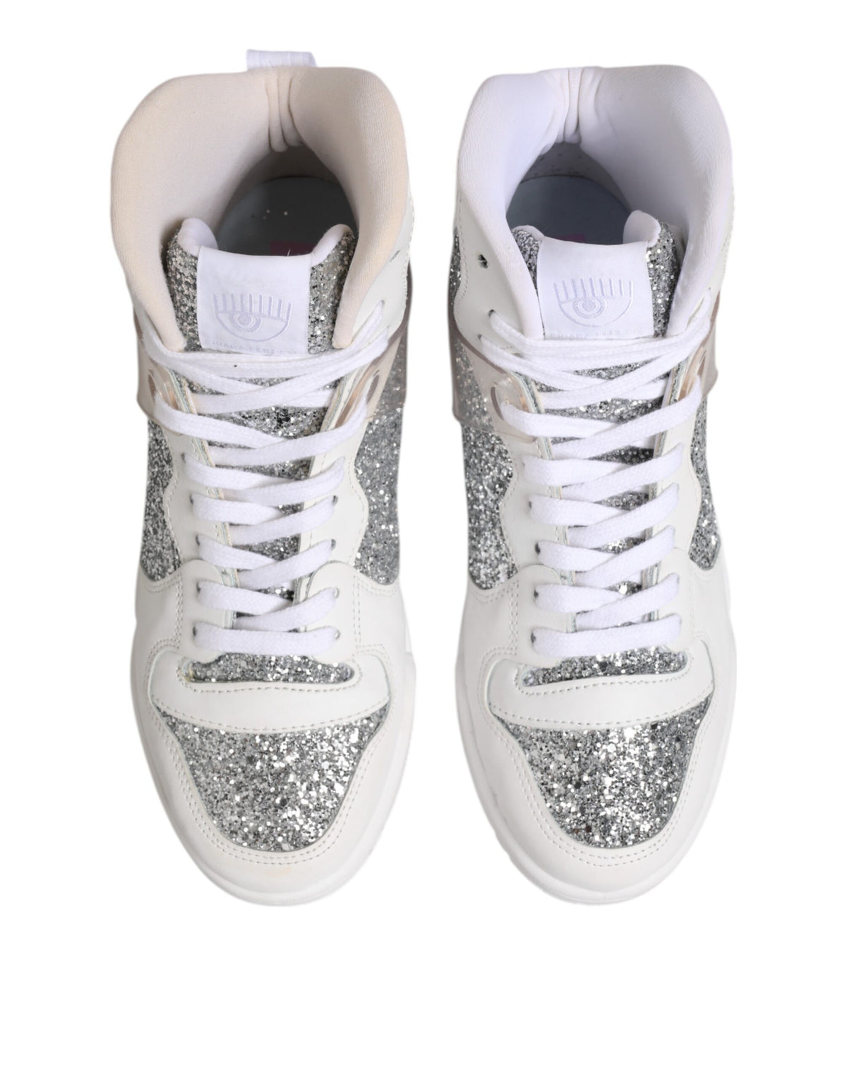 Step into a world of elegance with Chiara Ferragni's White Silver High Top Sneakers, crafted from authentic leather, embodying luxury and sophistication for the discerning individual.