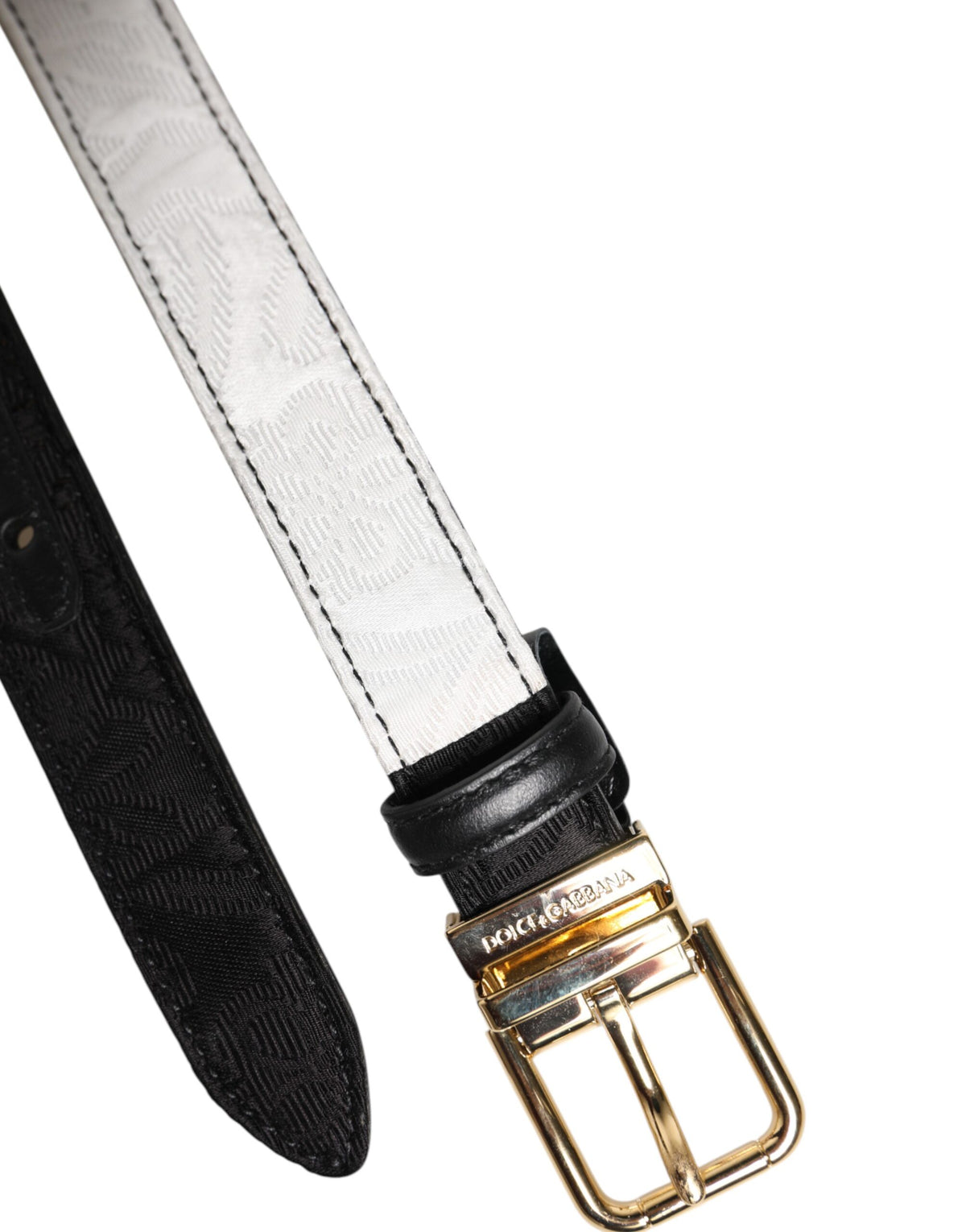 Elevate your style with the Dolce & Gabbana Black White Patchwork Gold Metal Buckle Belt, a testament to Italian craftsmanship and timeless luxury that transforms any ensemble.