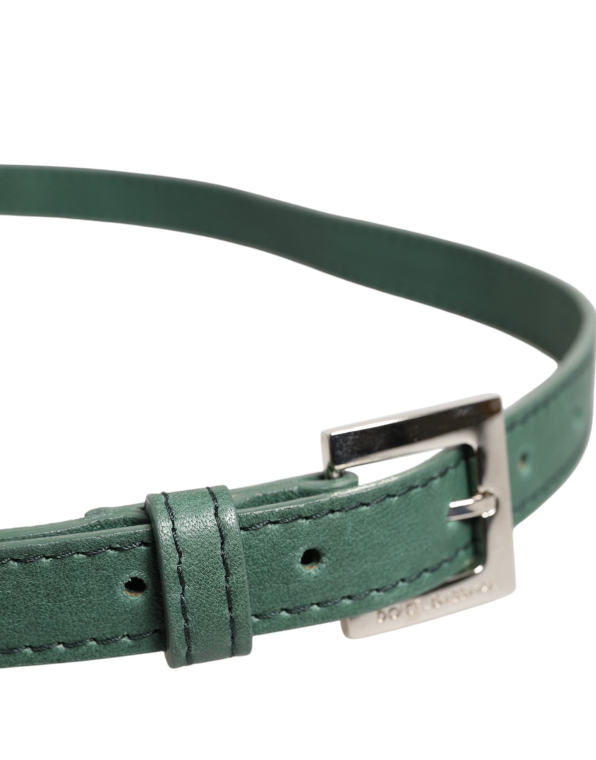 Elevate your style with the Dolce & Gabbana Dark Green Leather Silver Metal Buckle Belt, a masterpiece of Italian craftsmanship that embodies timeless luxury and sophistication.