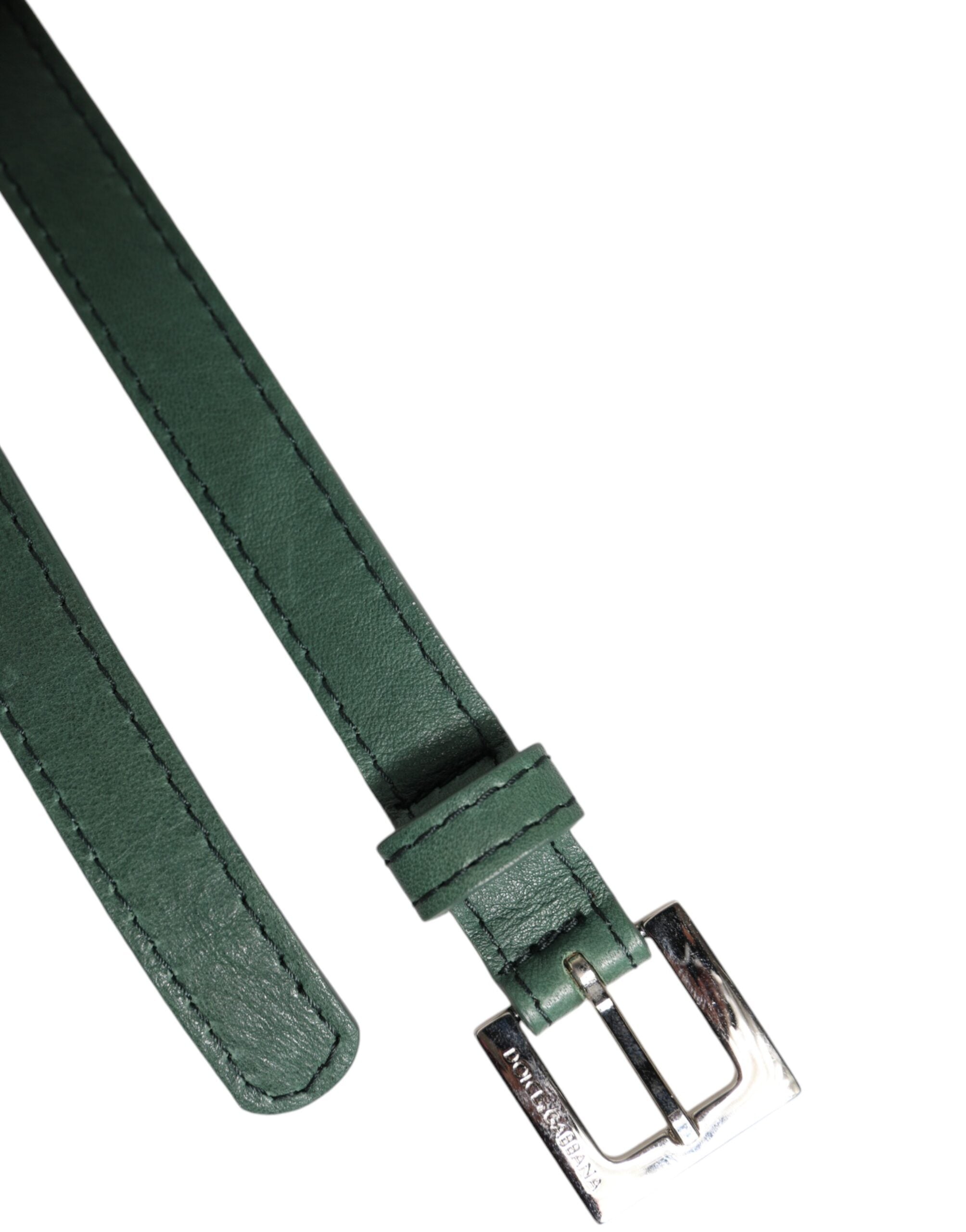 Elevate your style with the Dolce & Gabbana Dark Green Leather Silver Metal Buckle Belt, a masterpiece of Italian craftsmanship that embodies timeless elegance and versatile luxury.