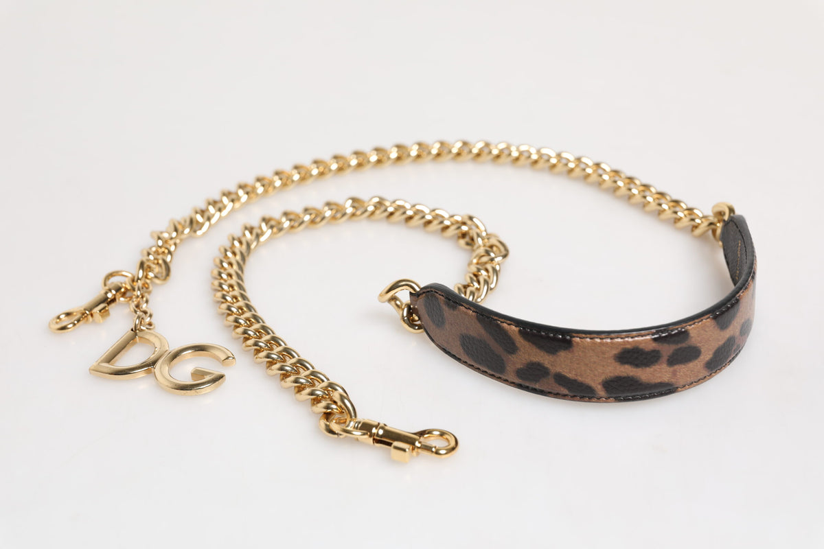 Elevate your style with the Dolce & Gabbana Brown Leopard Gold Brass Chain Accessory Shoulder Strap, a masterpiece of Italian craftsmanship in luxurious calf leather and gold detailing.