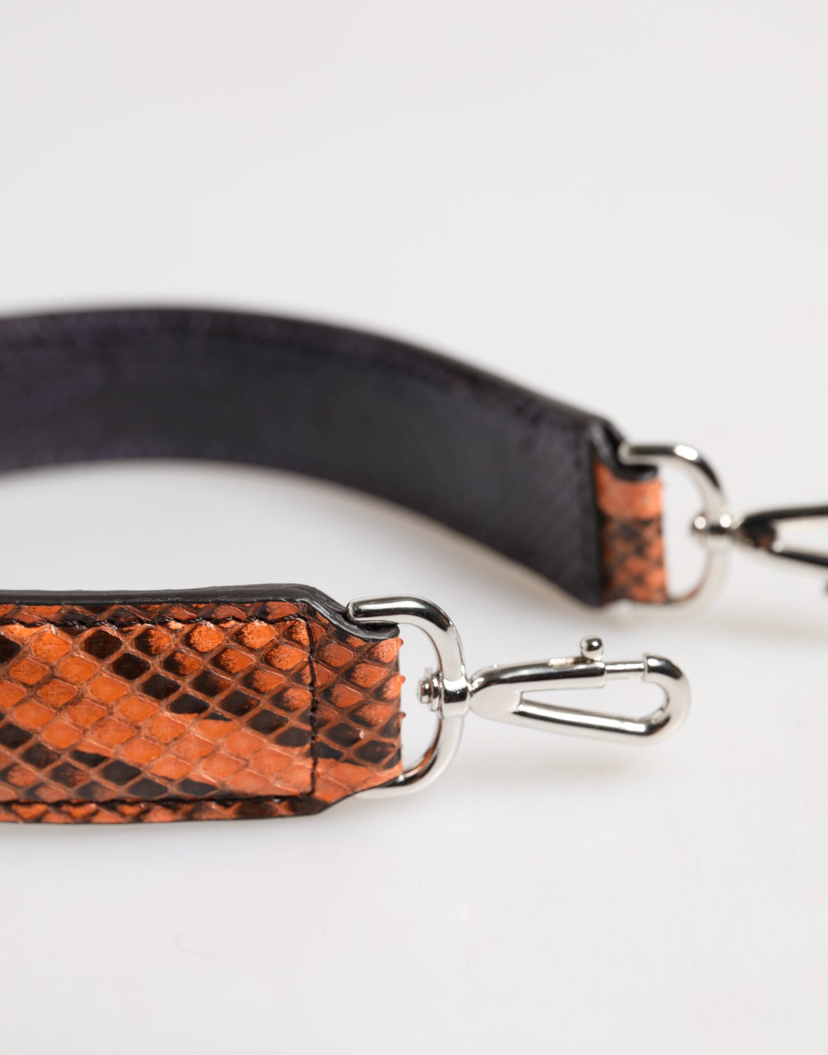 Elevate your style with the Dolce & Gabbana Orange Exotic Leather Bag Shoulder Strap, crafted from luxurious python leather, embodying bold elegance and timeless sophistication.