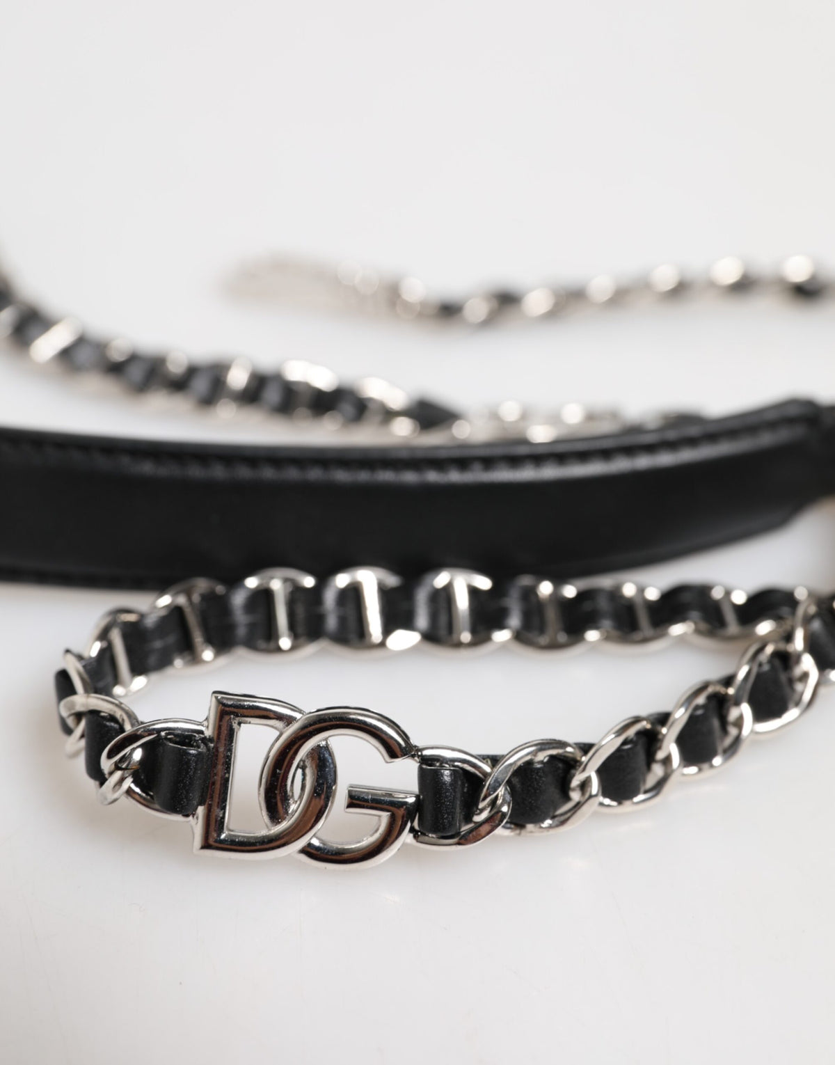 Elevate your style with the Dolce & Gabbana Black Leather DG Logo Chain Bag Shoulder Strap, a luxurious blend of artisanal craftsmanship and timeless elegance.