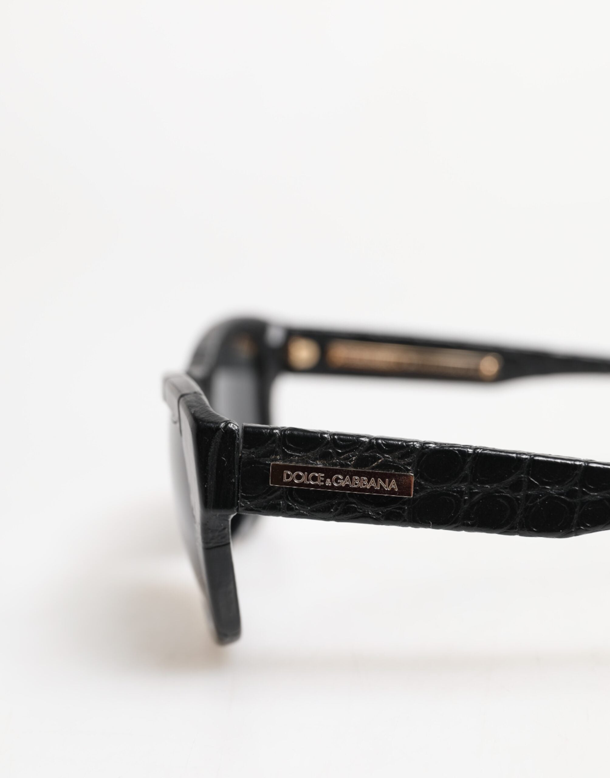 Discover the exquisite Dolce & Gabbana DG4177 sunglasses, where premium leather meets timeless elegance, elevating your haute couture collection with luxurious allure.