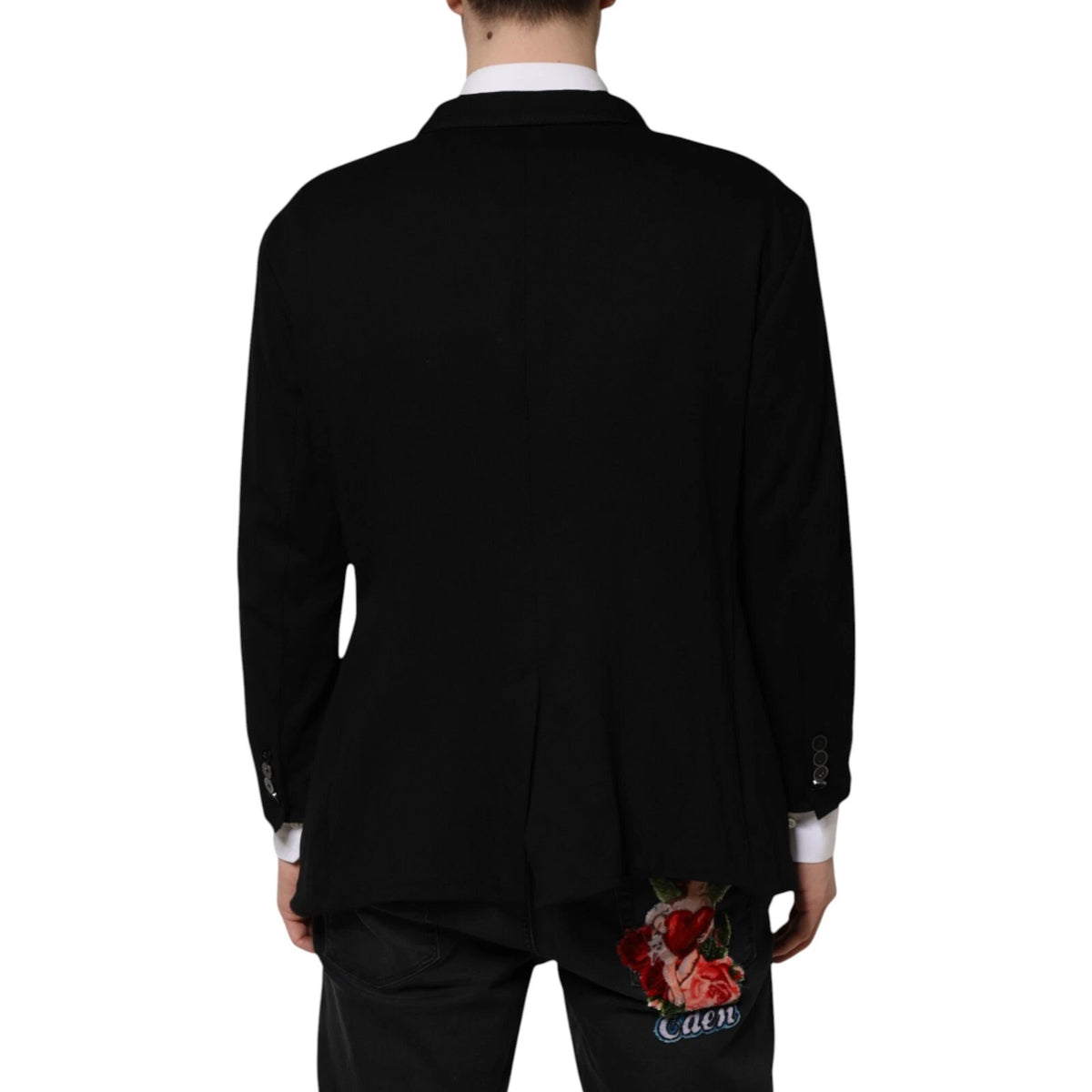 Elevate your wardrobe with the Dolce & Gabbana Black Viscose DG Crown Blazer, a masterpiece of Italian craftsmanship that embodies timeless luxury and sophisticated allure.