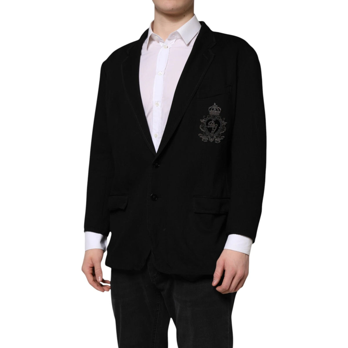 Elevate your wardrobe with the Dolce & Gabbana Black Viscose DG Crown Blazer, a masterpiece of Italian craftsmanship that embodies timeless luxury and sophisticated allure.