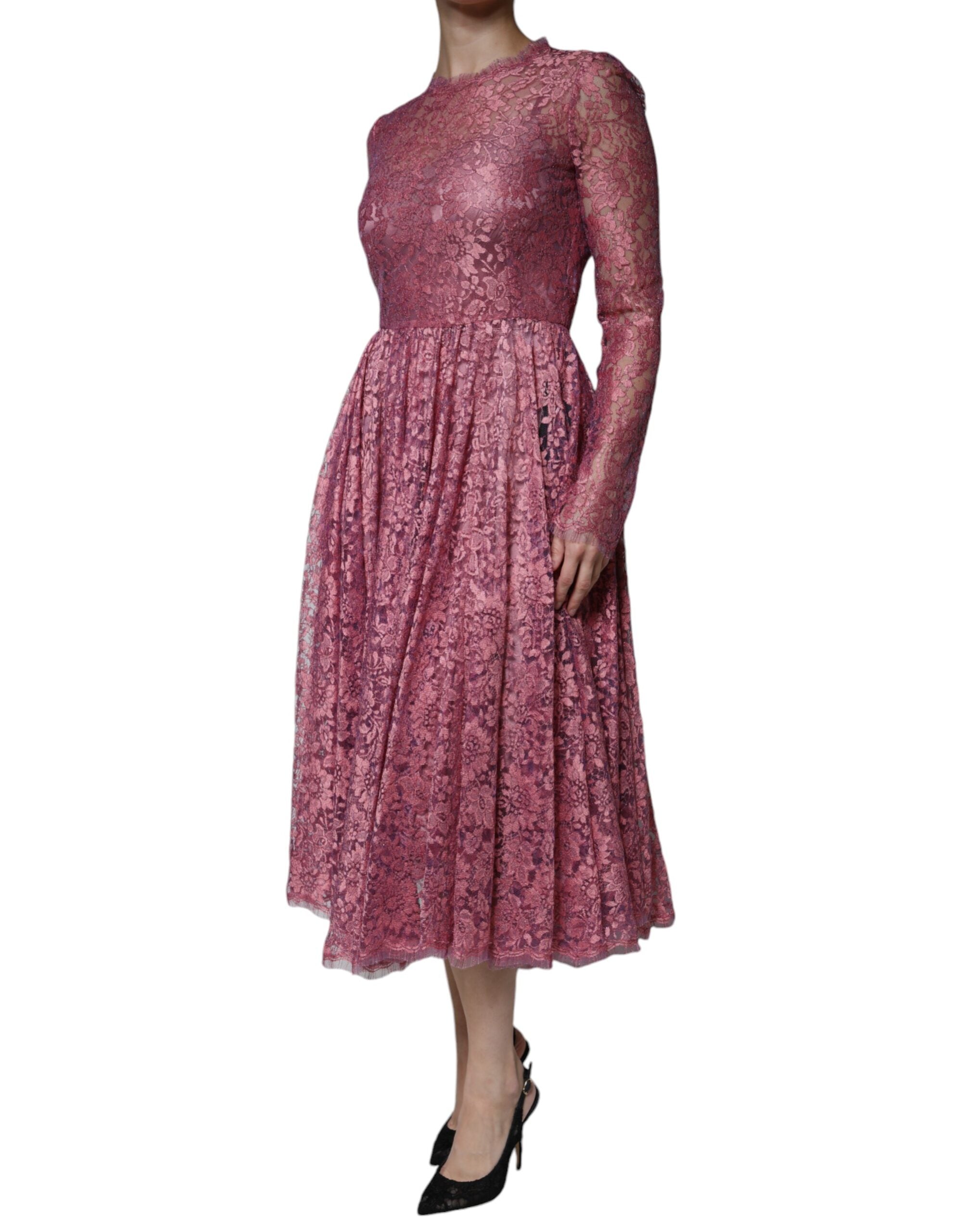 Experience the exquisite allure of the Dolce & Gabbana Pink Floral Lace Long Sleeve Midi Dress, a timeless piece that embodies romantic elegance and haute couture sophistication.