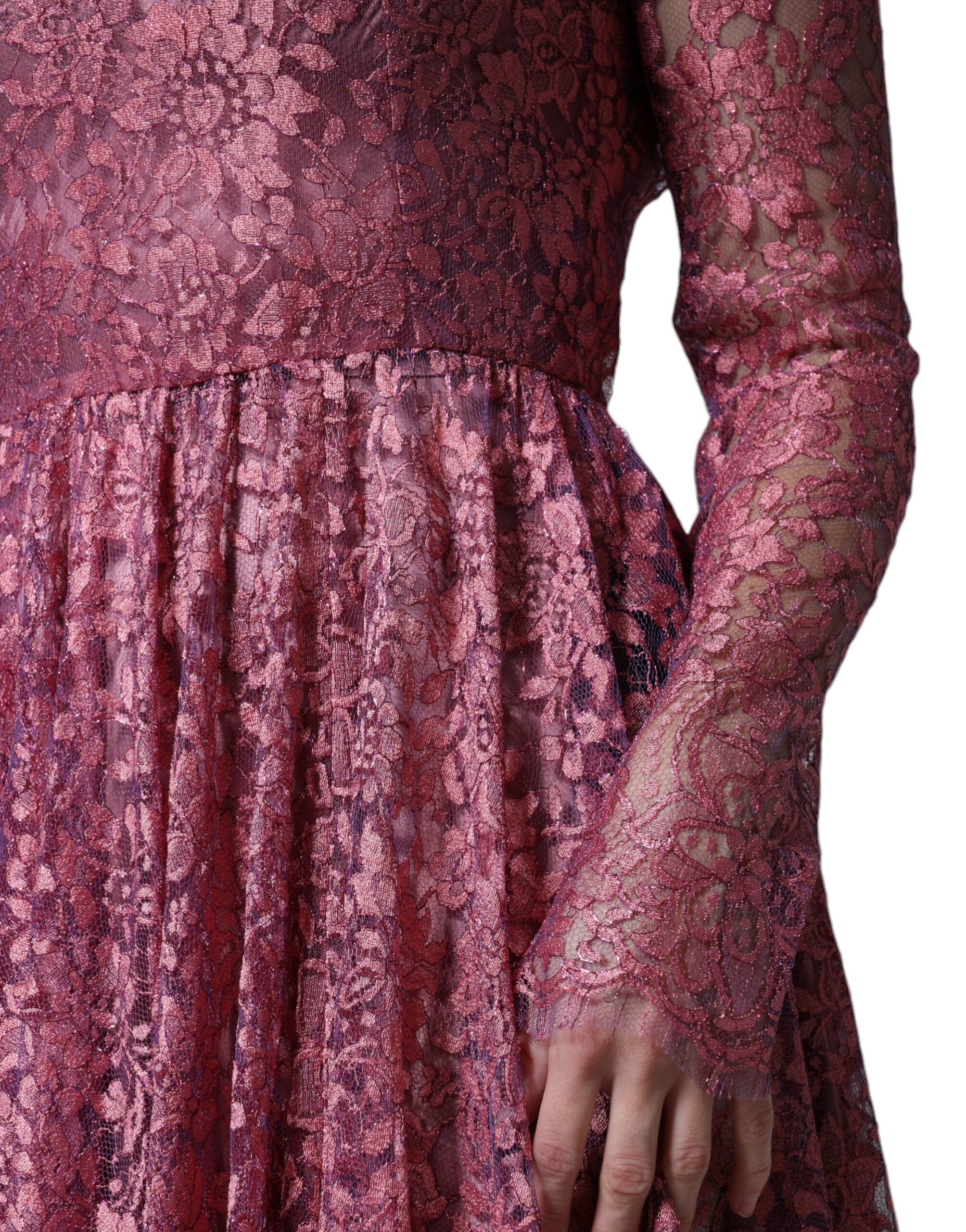 Experience the exquisite allure of the Dolce & Gabbana Pink Floral Lace Long Sleeve Midi Dress, a timeless haute couture masterpiece that embodies romantic sophistication and unrivaled craftsmanship.