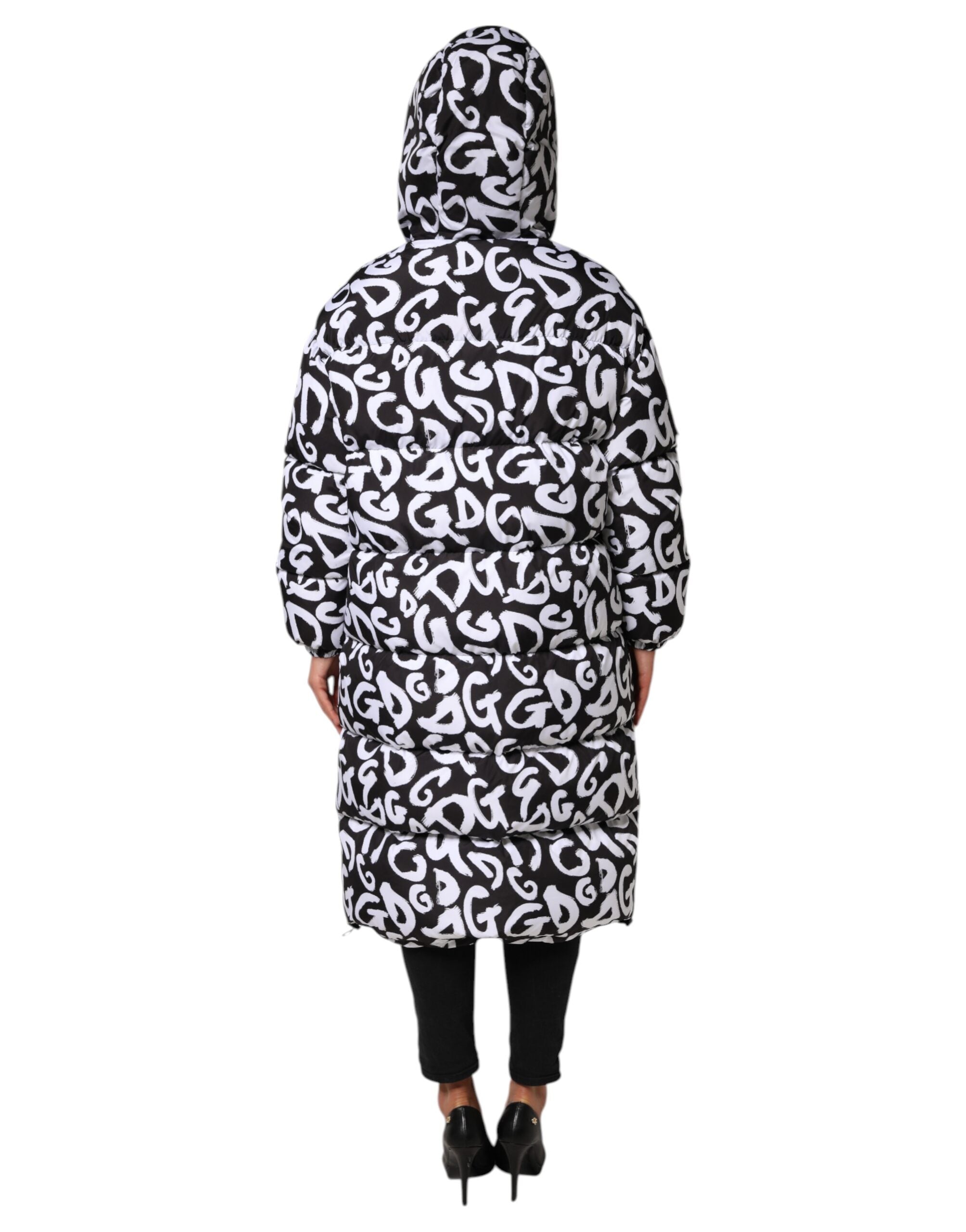 Indulge in the Dolce & Gabbana Black White DG Mania Hooded Long Coat, where exquisite Italian craftsmanship meets contemporary elegance, embodying luxury and sophistication.