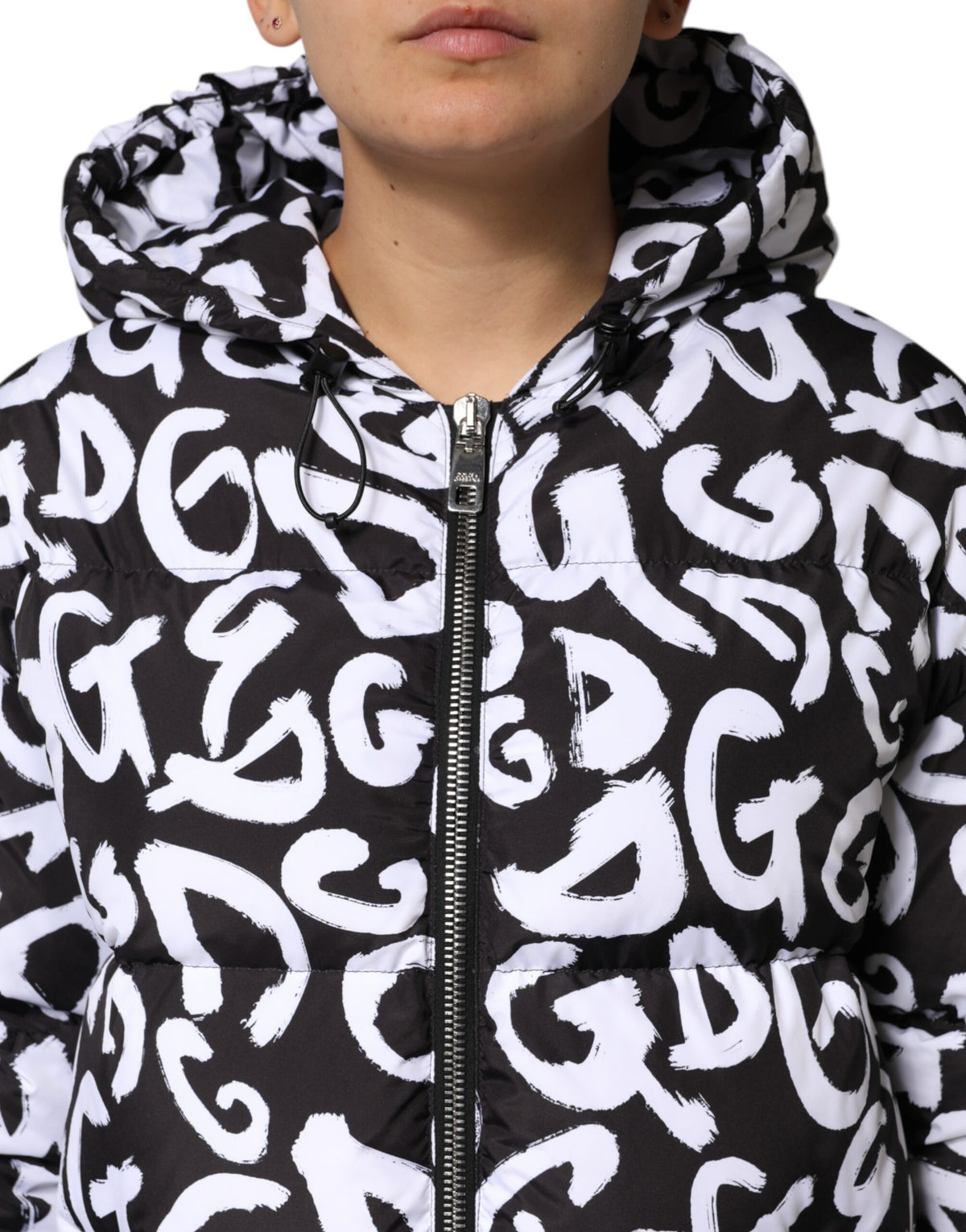 Indulge in the exquisite Dolce & Gabbana Black White DG Mania Hooded Long Coat, crafted from luxurious polyester, embodying Italian artistry and timeless elegance.
