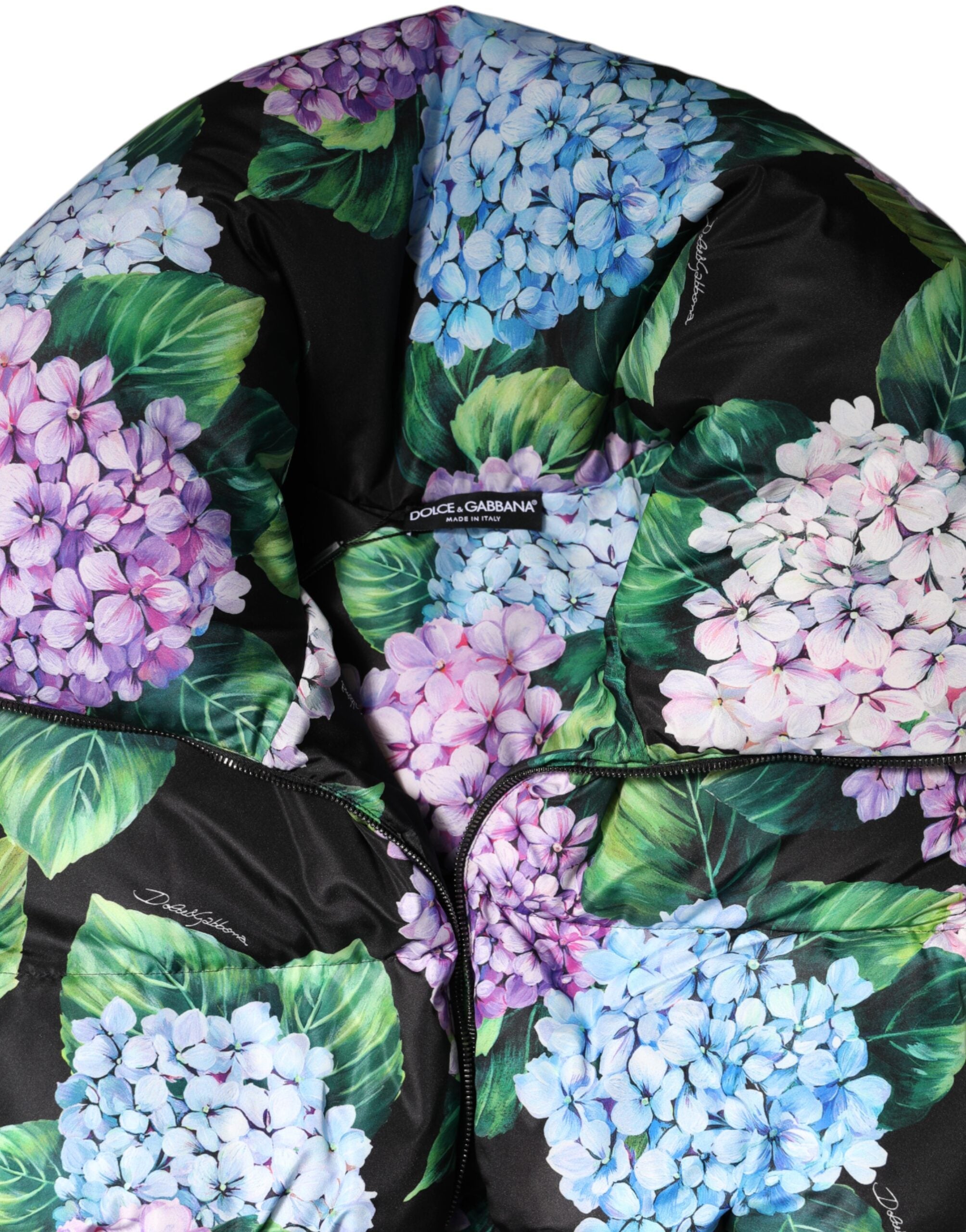 Indulge in the exquisite Dolce & Gabbana Multicolor Floral Print Puffer Quilted Jacket, a luxurious blend of artistry and comfort, perfect for elevating any occasion.