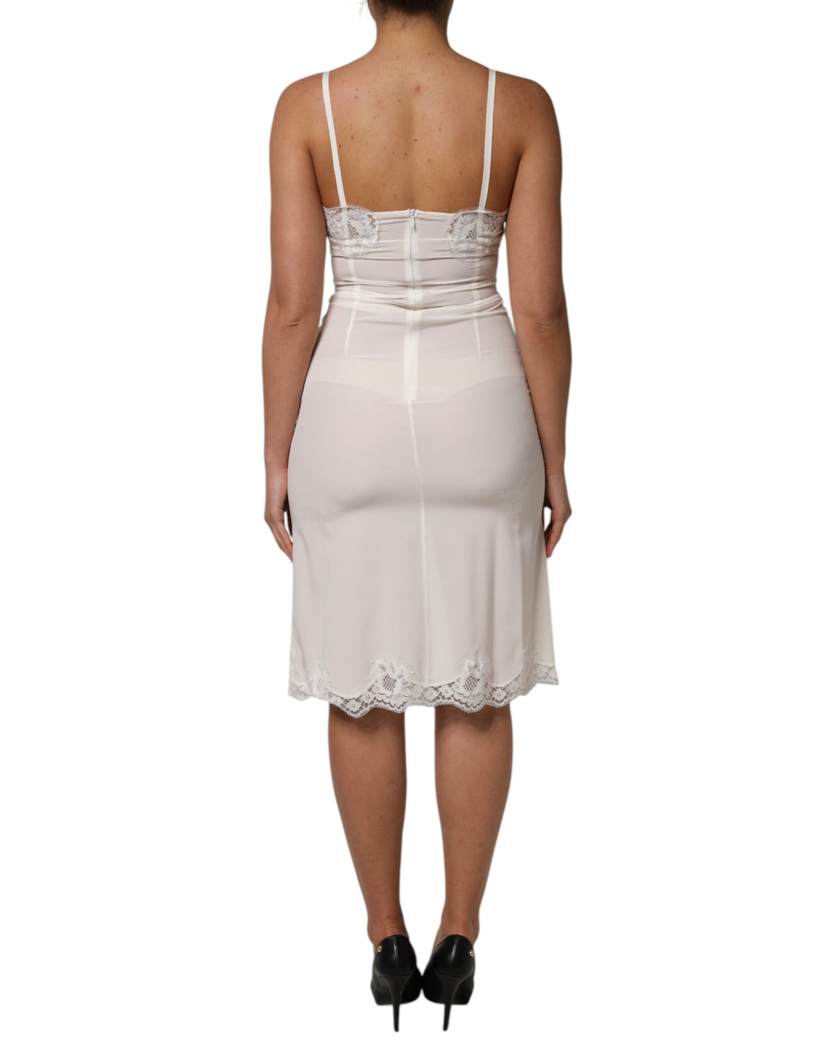 Indulge in the exquisite Dolce & Gabbana White Lace Gold DG Logo Silk Dress Sleepwear, a timeless piece crafted in Italy from luxurious silk and cotton, perfect for elevating intimate moments.