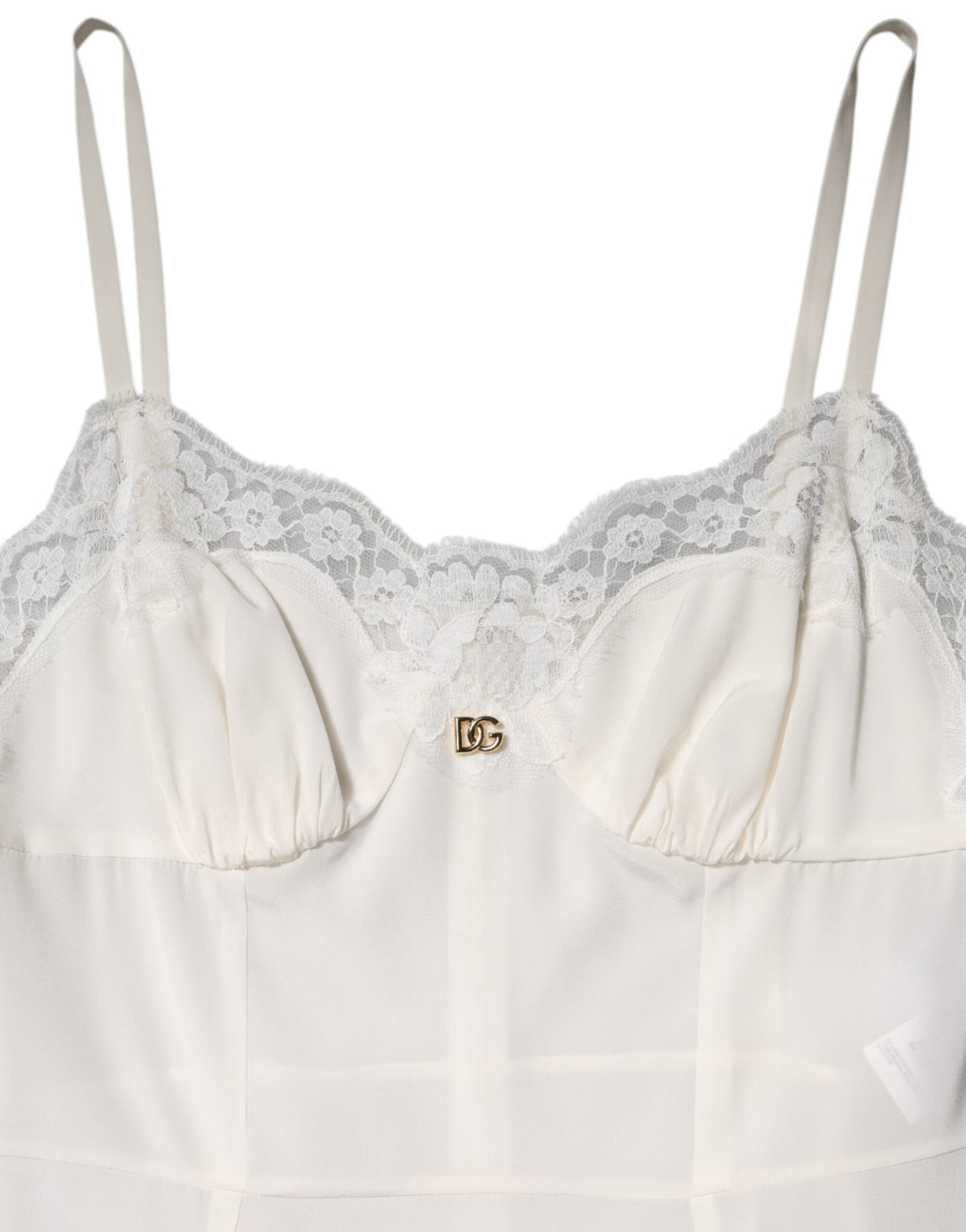 Indulge in the exquisite Dolce & Gabbana White Lace DG Logo Silk Dress Sleepwear, a luxurious blend of silk and cotton, embodying timeless elegance and refined sensuality.