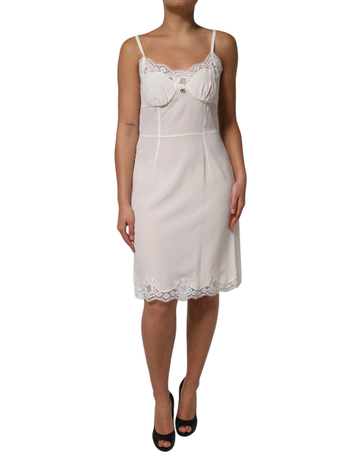 Indulge in the exquisite allure of Dolce & Gabbana's White Lace Gold DG Logo Silk Dress Sleepwear, a handcrafted masterpiece that epitomizes luxury and timeless elegance.