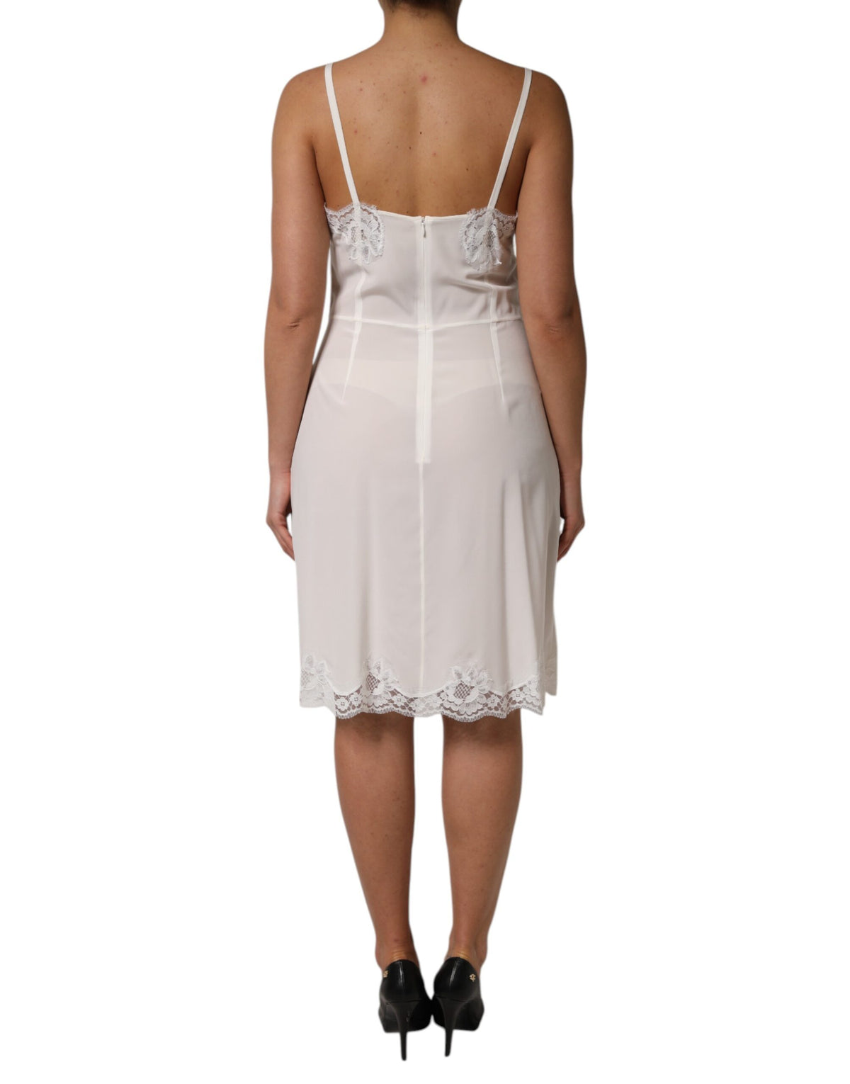 Experience the allure of Dolce & Gabbana's White Lace Gold DG Logo Silk Dress Sleepwear, a handcrafted masterpiece in silk and lace, perfect for intimate evenings or elegant outings.