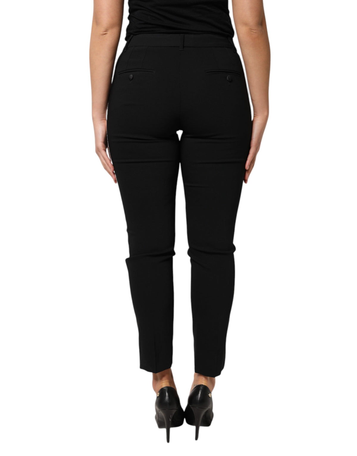 Elevate your wardrobe with Dolce & Gabbana's Black Wool High Waist Tapered Pants, a masterpiece of Italian craftsmanship blending virgin wool and silk for timeless sophistication.