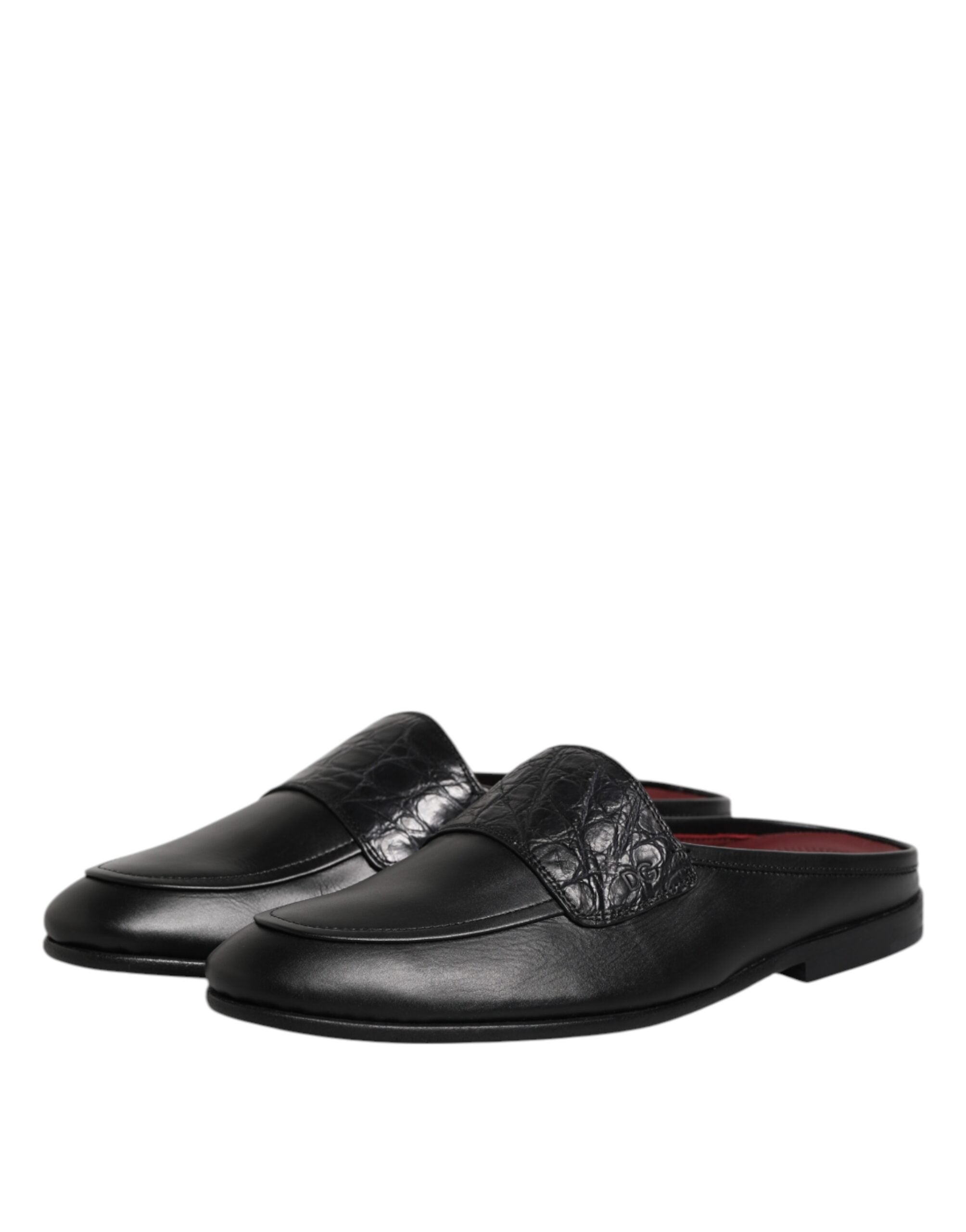 Experience the exquisite craftsmanship of Dolce & Gabbana's Black Calfskin Leather Slip On Loafers, where timeless elegance meets luxurious comfort for the discerning individual.