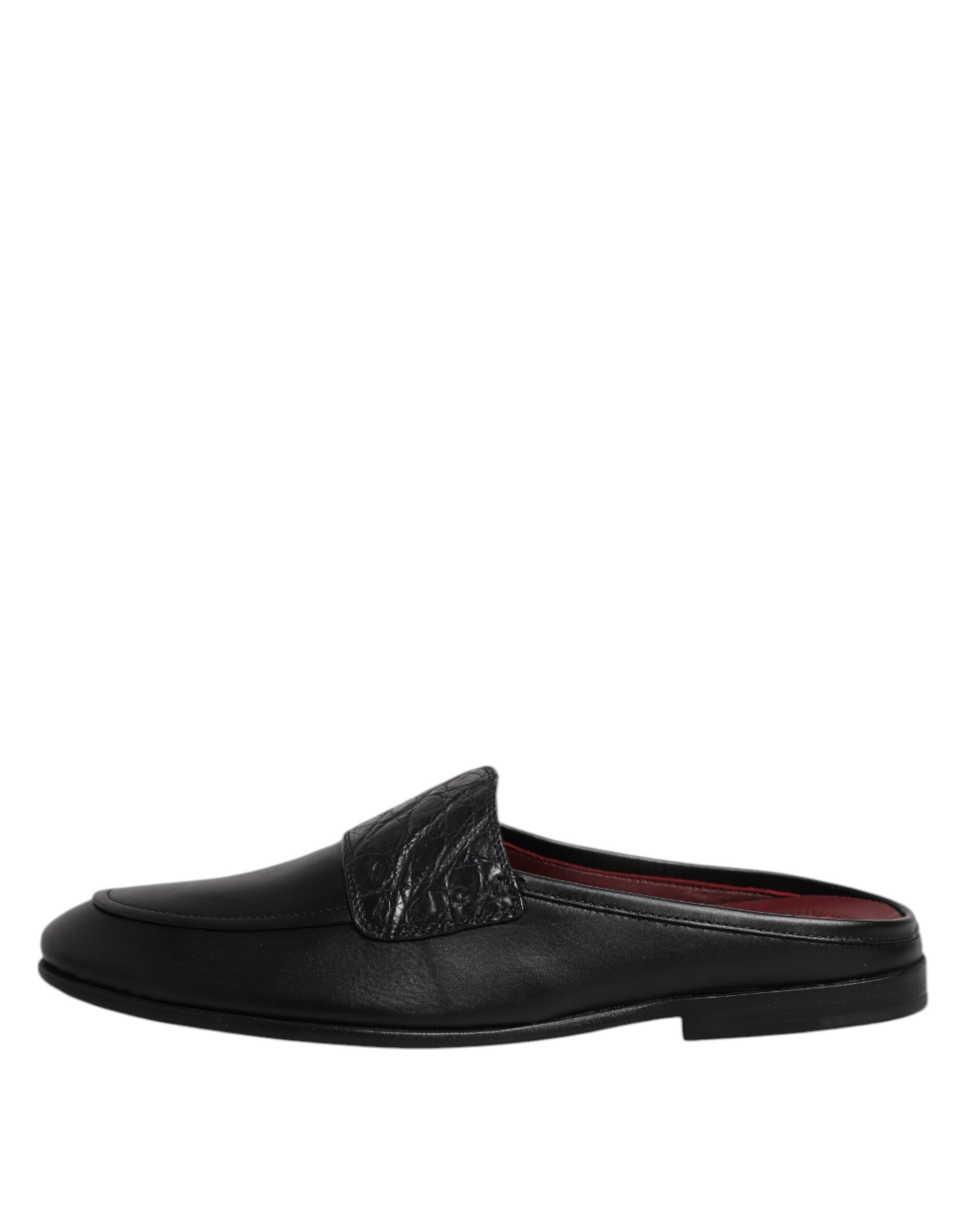 Step into a realm of elegance with Dolce & Gabbana's Black Calfskin Leather Slip On Loafers, where exquisite craftsmanship and luxurious materials redefine sophistication.