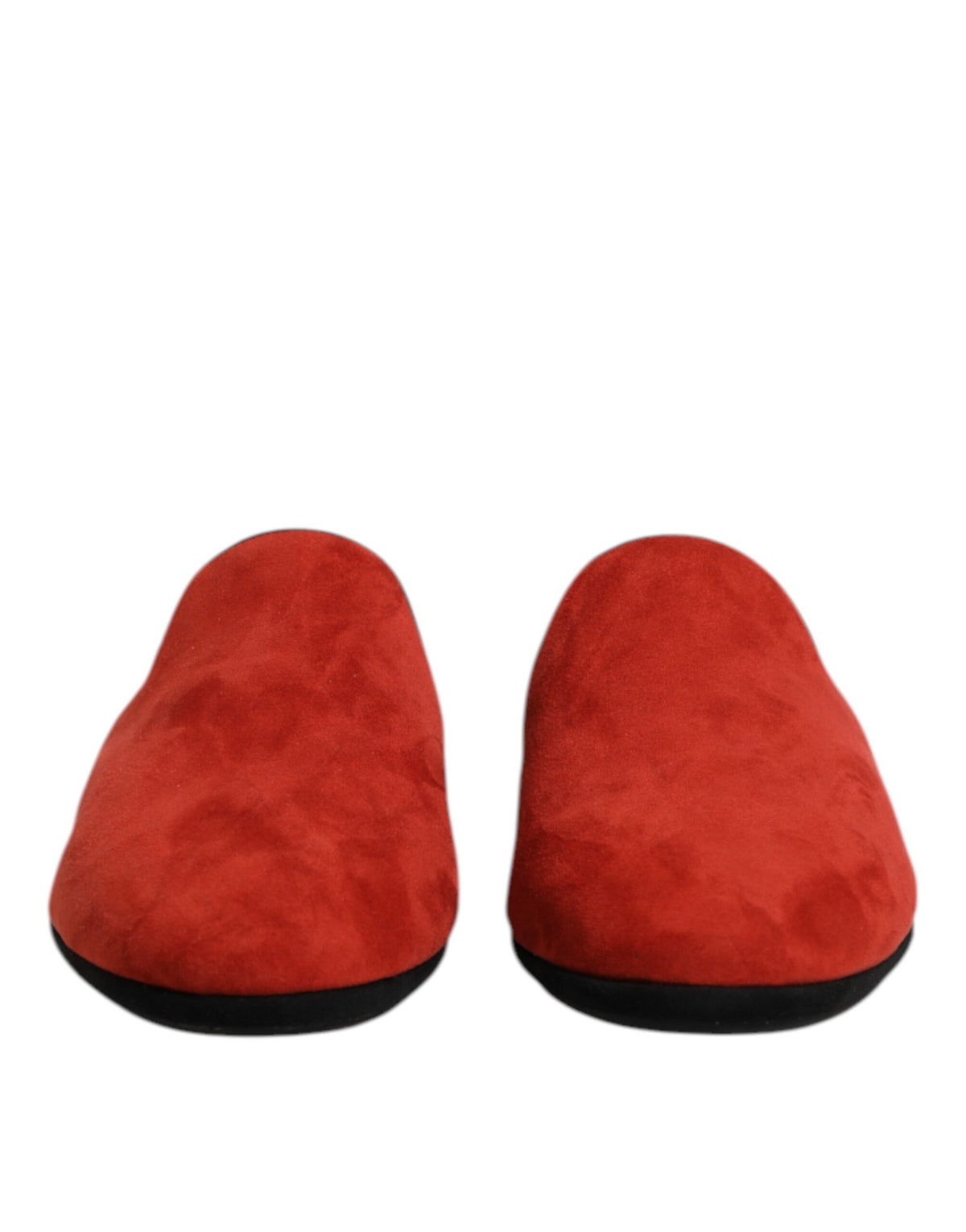 Experience the allure of Dolce & Gabbana Orange Suede Slides, crafted from 100% Capra leather, embodying Italian artistry and luxurious comfort for the discerning individual.