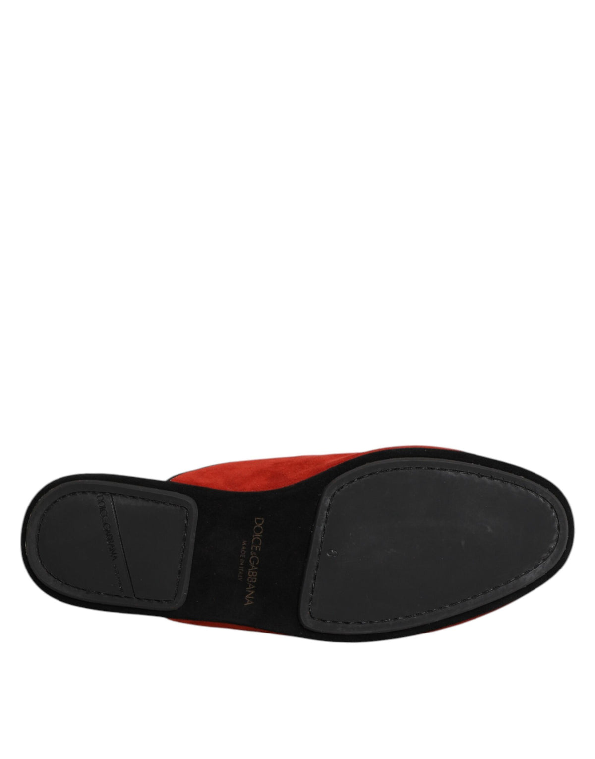 Experience the allure of Dolce & Gabbana Orange Suede Slides, crafted from 100% Capra leather, embodying Italian artistry and luxurious comfort for the discerning individual.