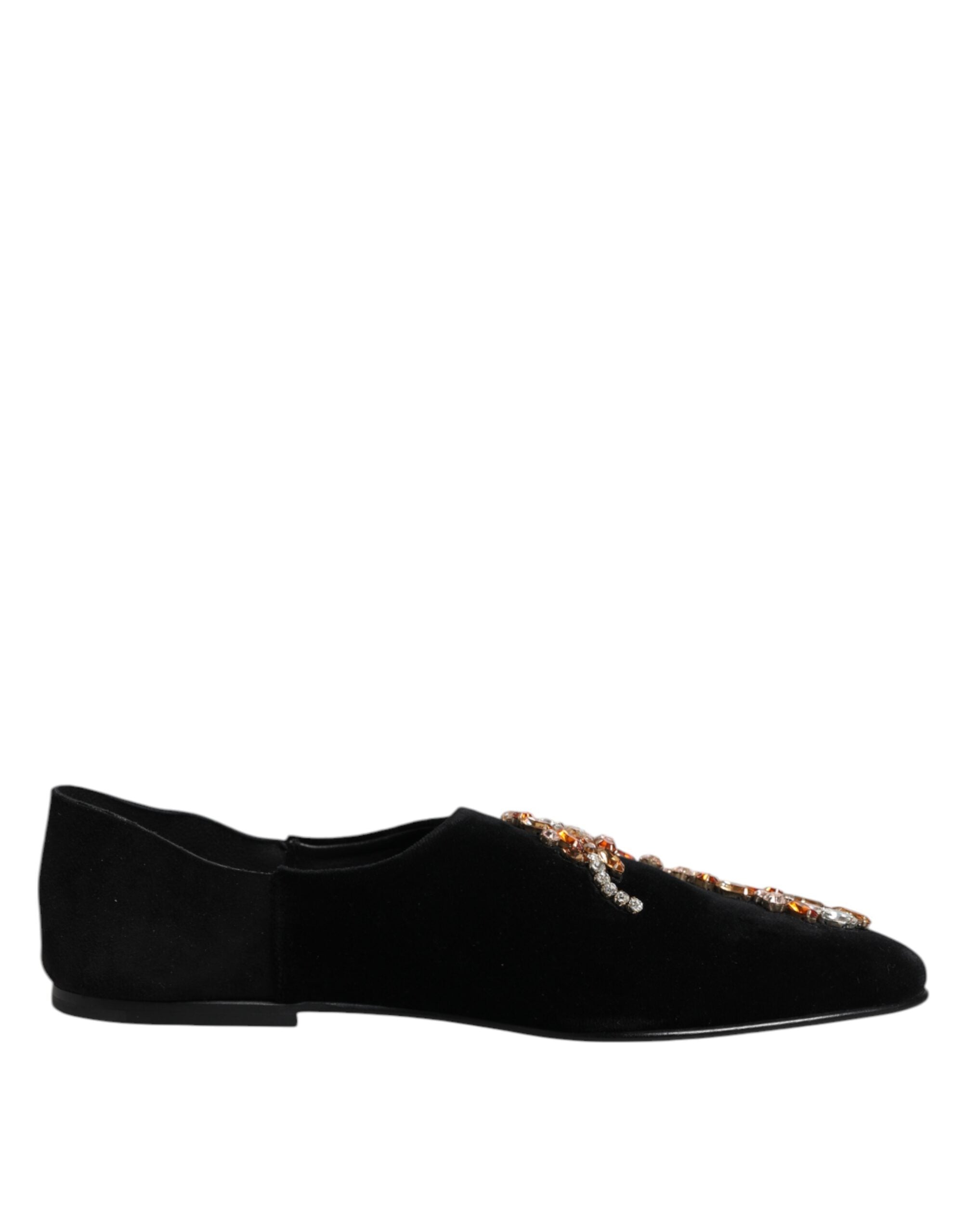 Elevate your style with Dolce & Gabbana's Black Velvet Embellished Loafer Slip On Shoes, where exquisite craftsmanship meets timeless elegance for the discerning individual.
