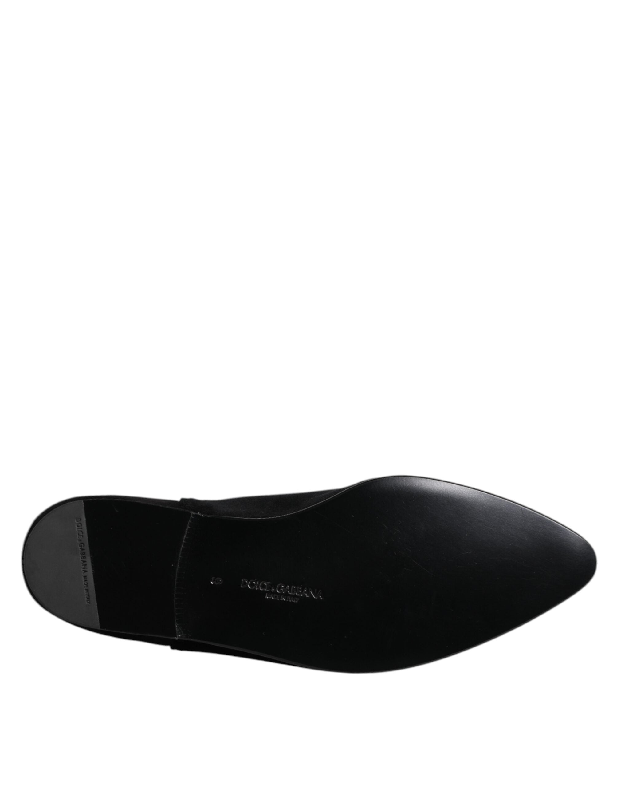 Experience the exquisite craftsmanship of Dolce & Gabbana's Black Velvet Embellished Loafer Slip On Shoes, a luxurious blend of elegance and comfort for the discerning individual.