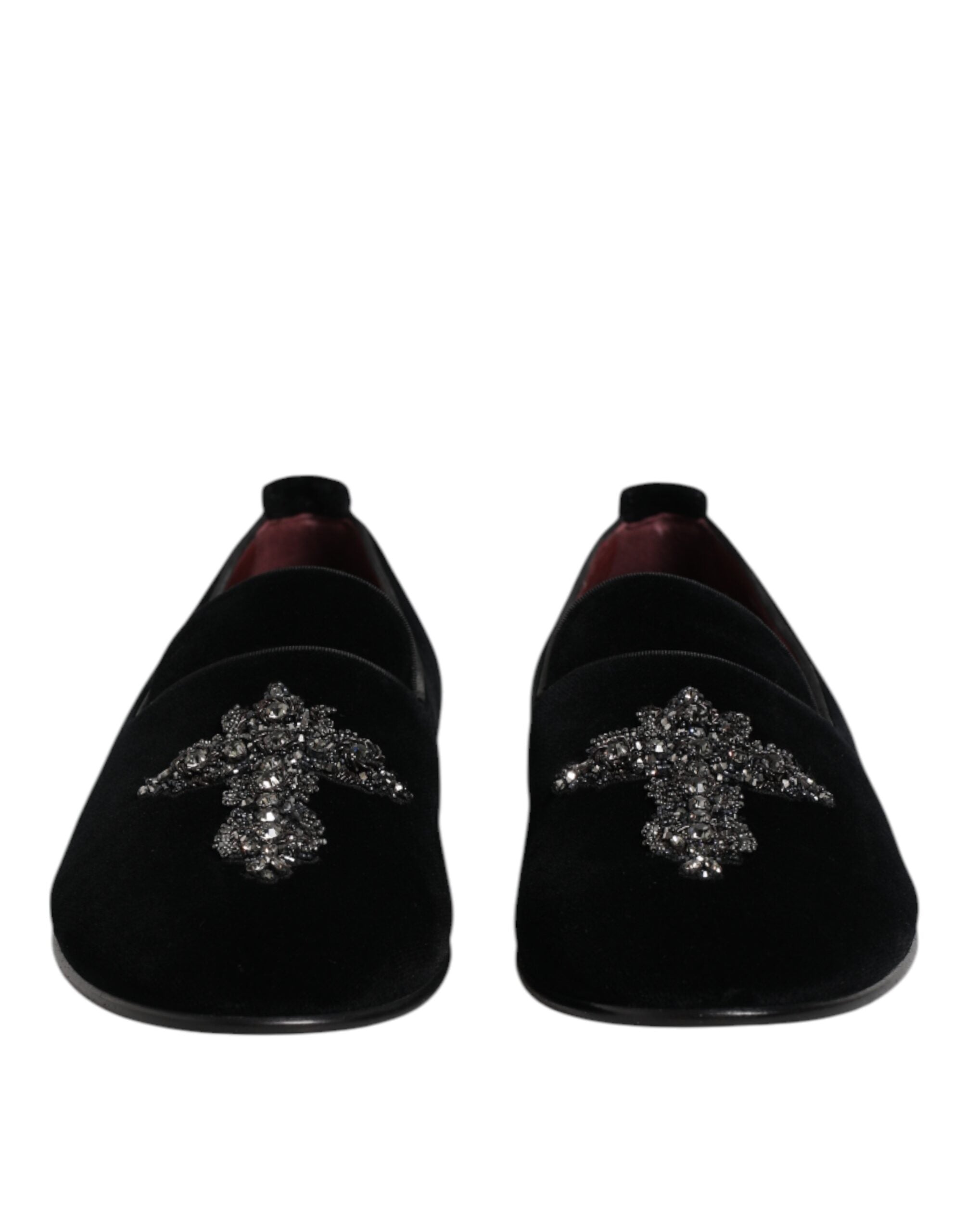 Step into unparalleled elegance with Dolce & Gabbana's Black Velvet Embellished Loafer, a masterpiece of Italian craftsmanship designed for the discerning individual.