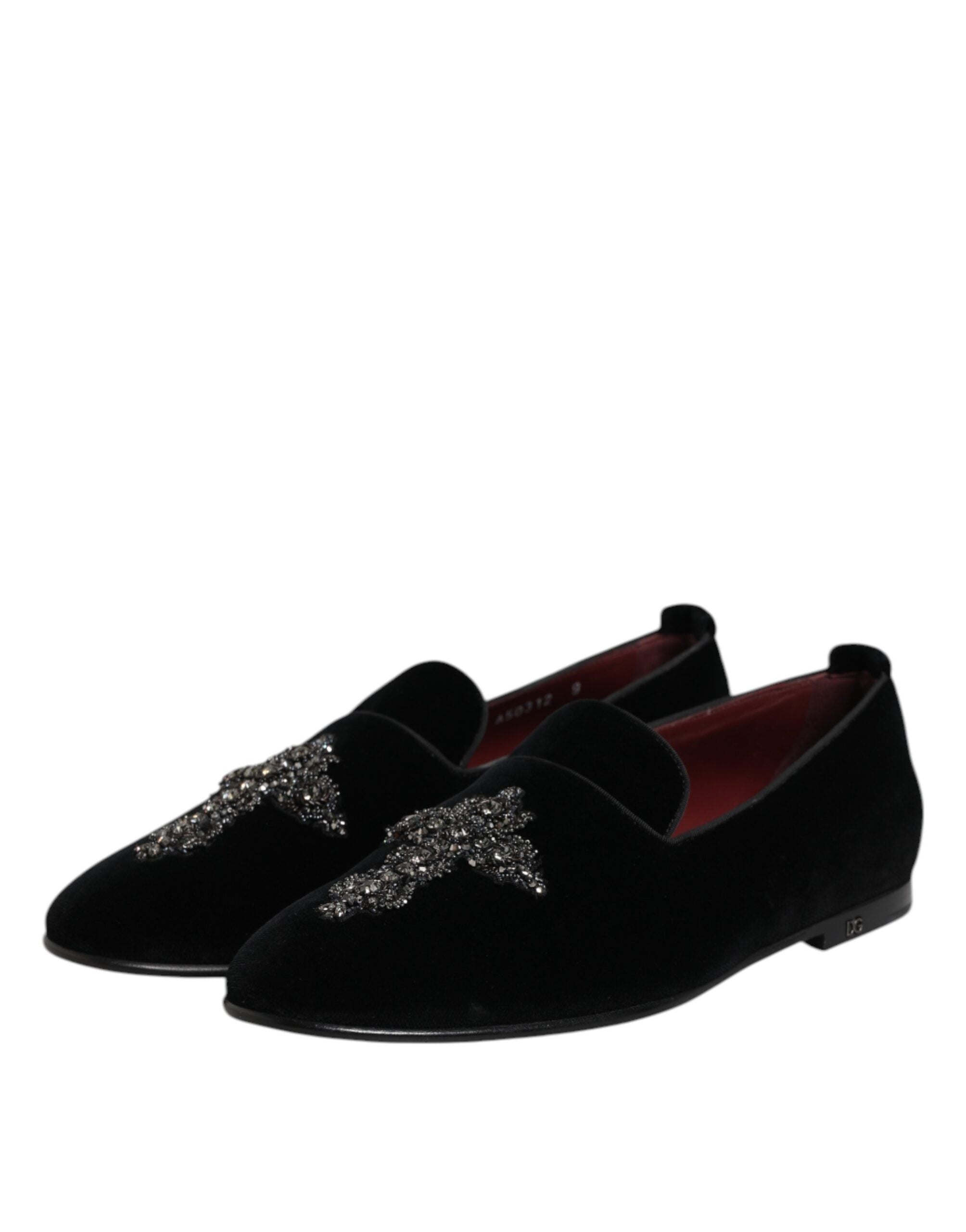 Indulge in the exquisite allure of Dolce & Gabbana's Black Velvet Embellished Loafer, a testament to Italian craftsmanship that elevates your elegance and sophistication.