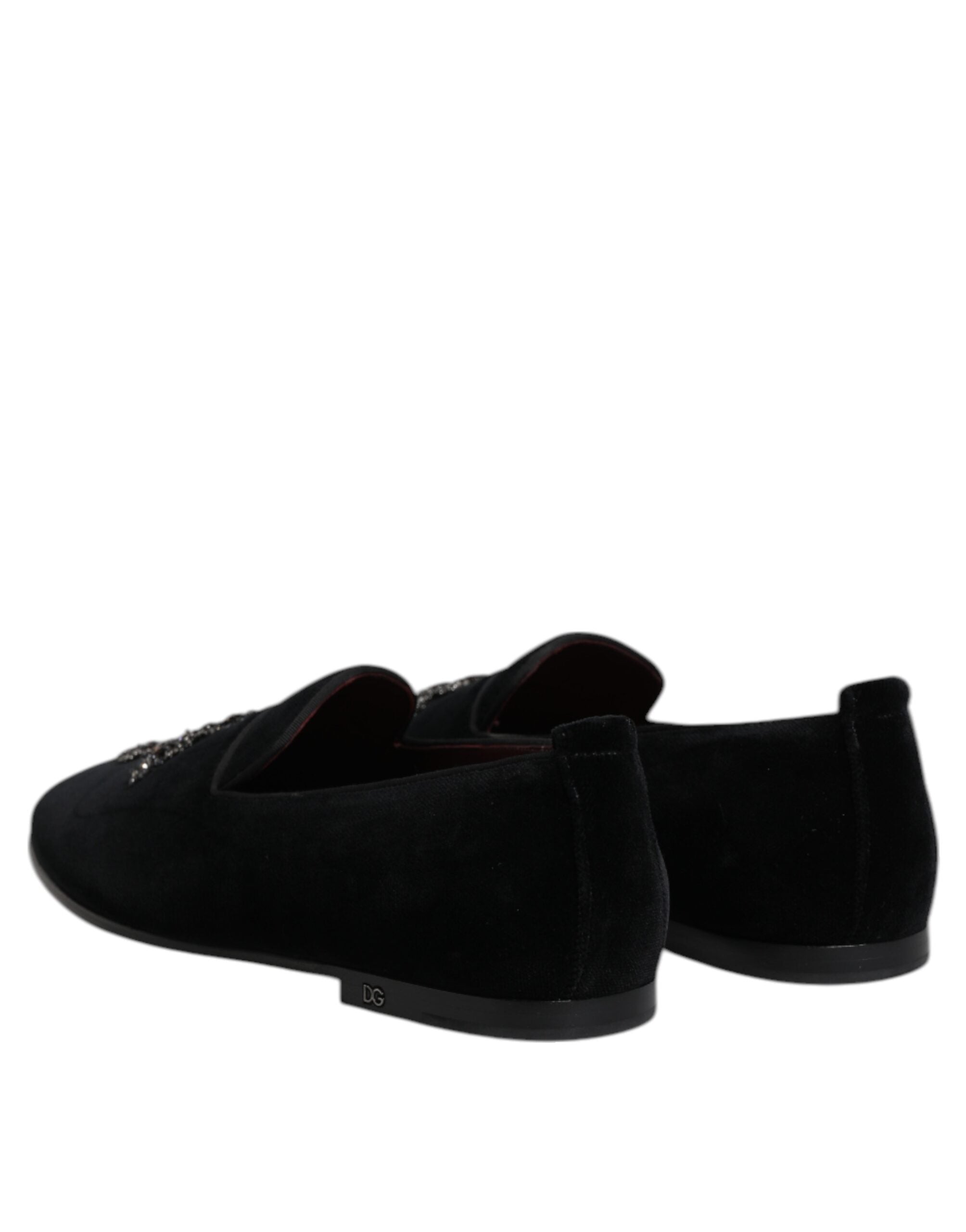 Step into the allure of Dolce & Gabbana's Black Velvet Embellished Loafer, where exquisite craftsmanship meets timeless elegance, perfect for the discerning individual.