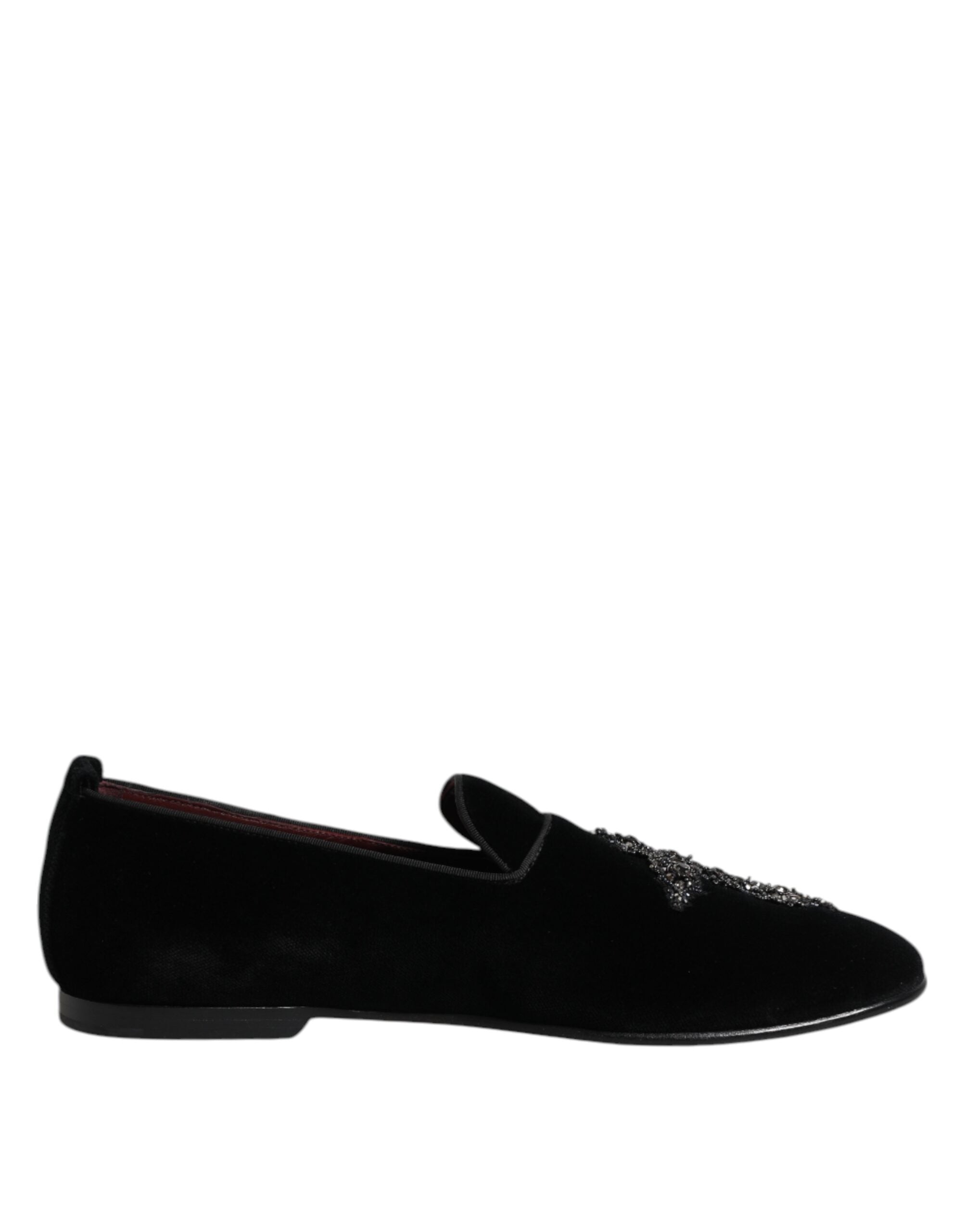 Step into a realm of sophistication with Dolce & Gabbana's Black Velvet Embellished Loafer, where exquisite craftsmanship meets timeless luxury for the discerning individual.