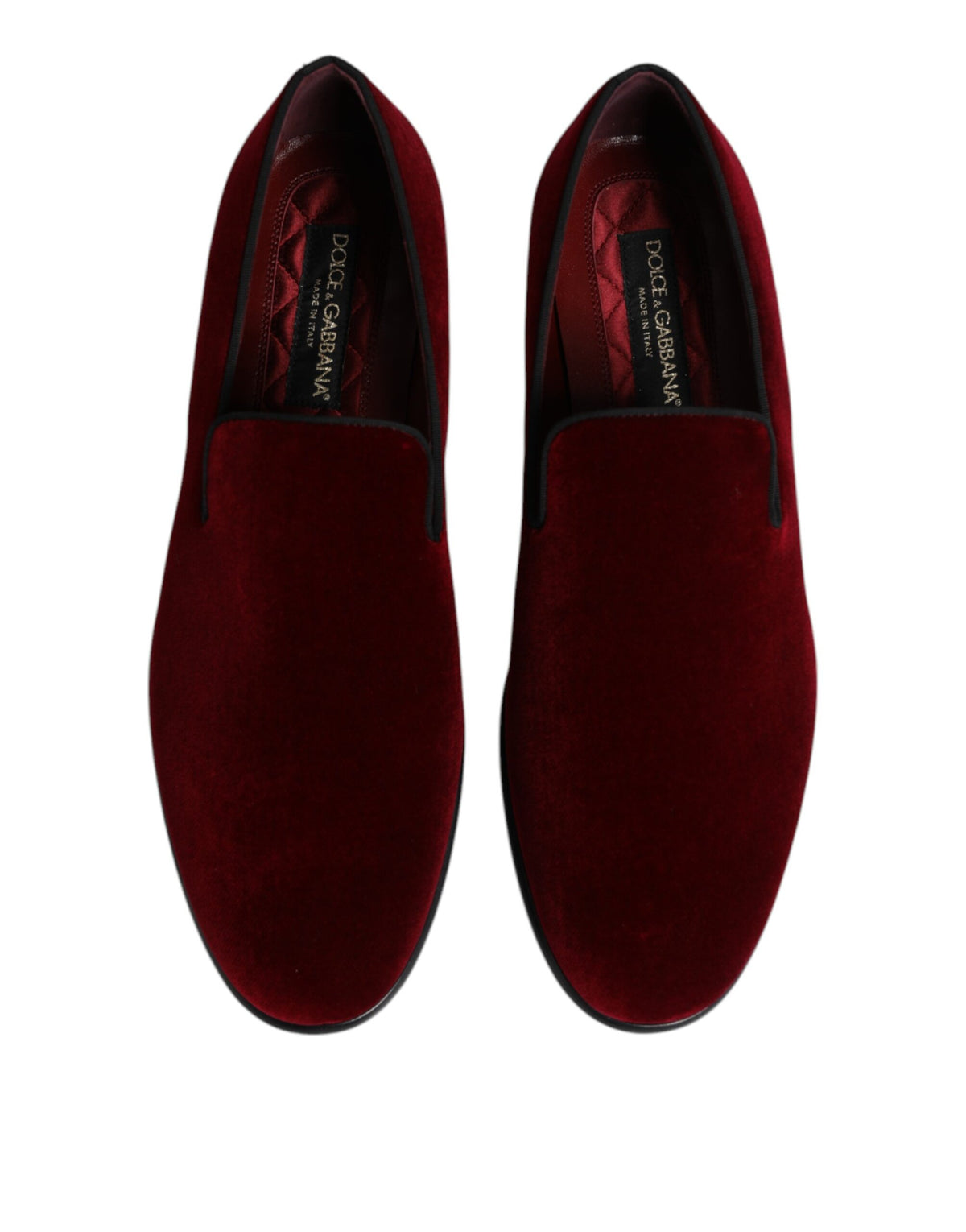 Discover the exquisite Dolce & Gabbana Red Cotton Velvet Slip On Loafers, where sumptuous craftsmanship meets timeless elegance, perfect for the discerning connoisseur.