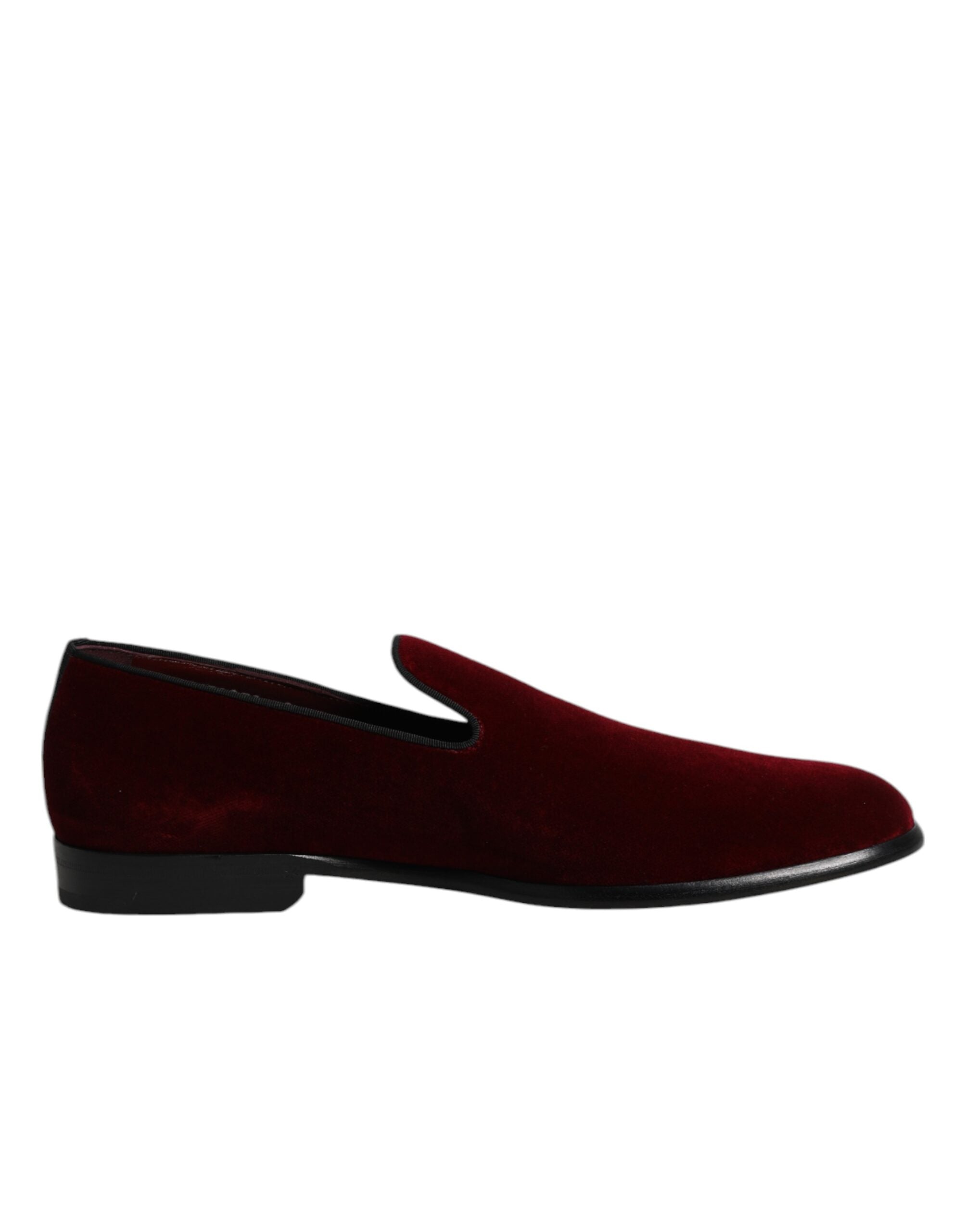 Step into a world of refined elegance with Dolce & Gabbana Red Cotton Velvet Slip On Loafers, where sumptuous materials meet Italian artistry for an unforgettable statement.