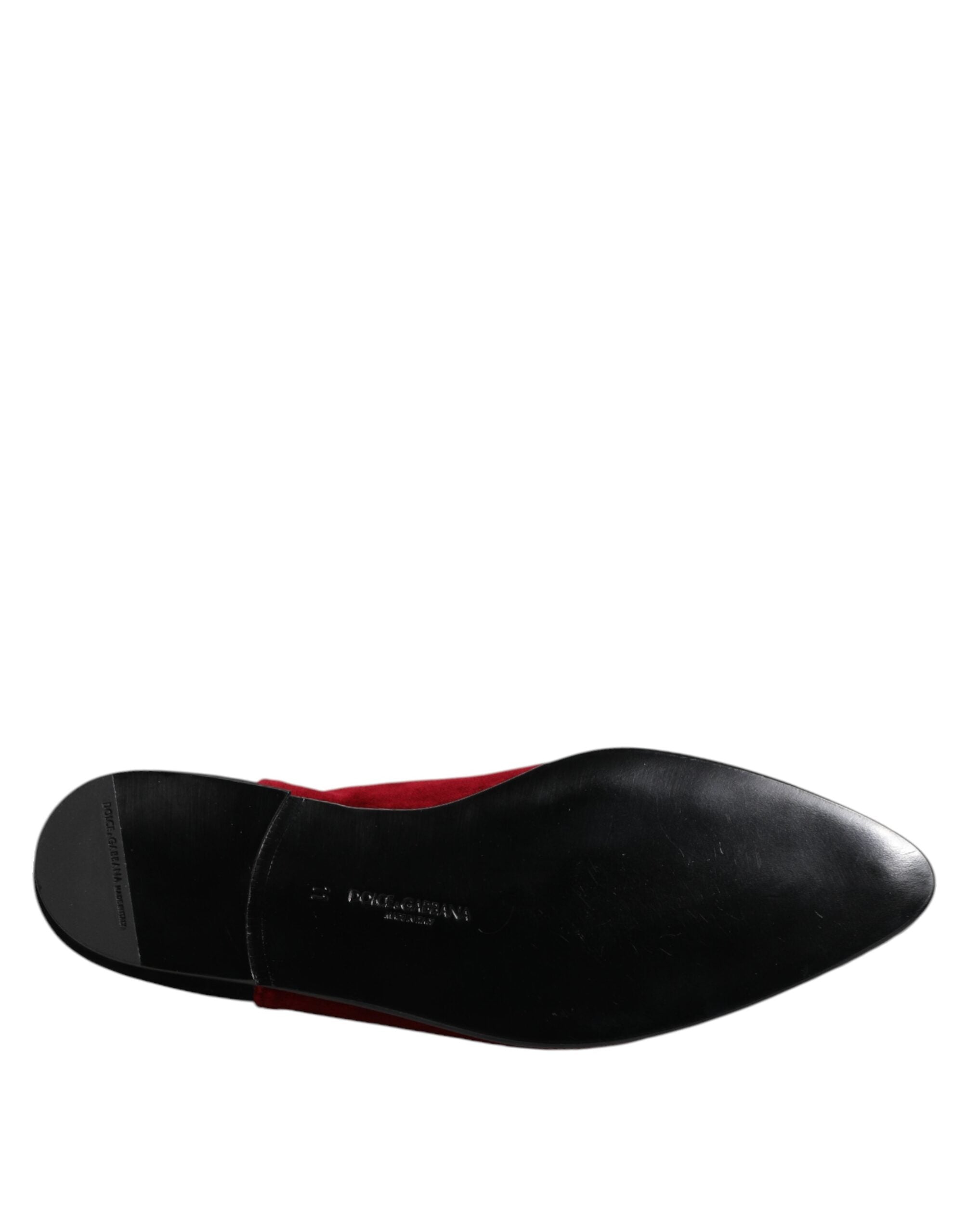 Indulge in the exquisite Dolce & Gabbana Black Red Velvet Embellished Slip On Shoes, where luxurious craftsmanship meets timeless elegance, perfect for the discerning individual.