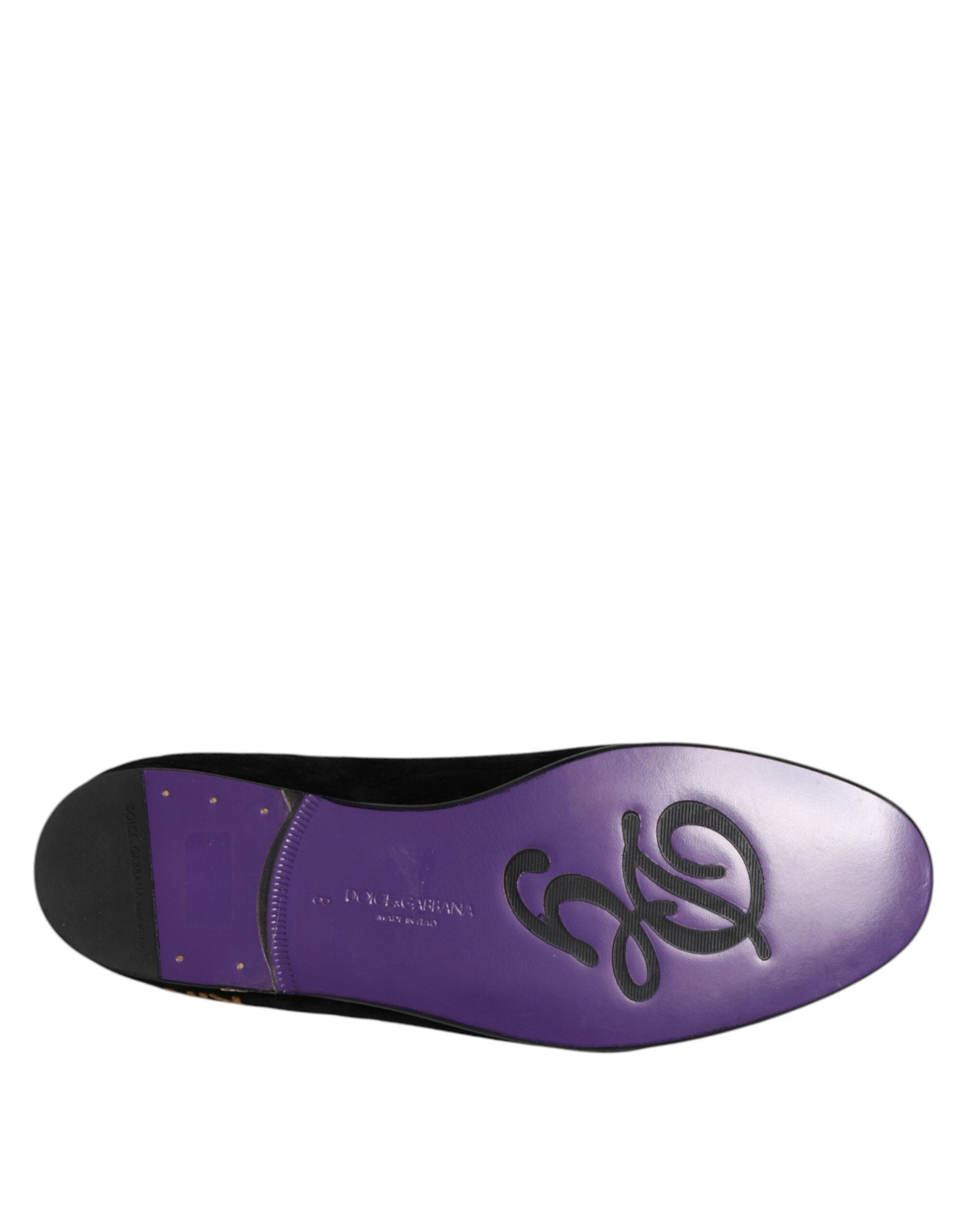 Indulge in the exquisite Dolce & Gabbana Black DG Crown Embroidery Loafers, where Italian craftsmanship meets luxurious materials for timeless elegance and refined allure.