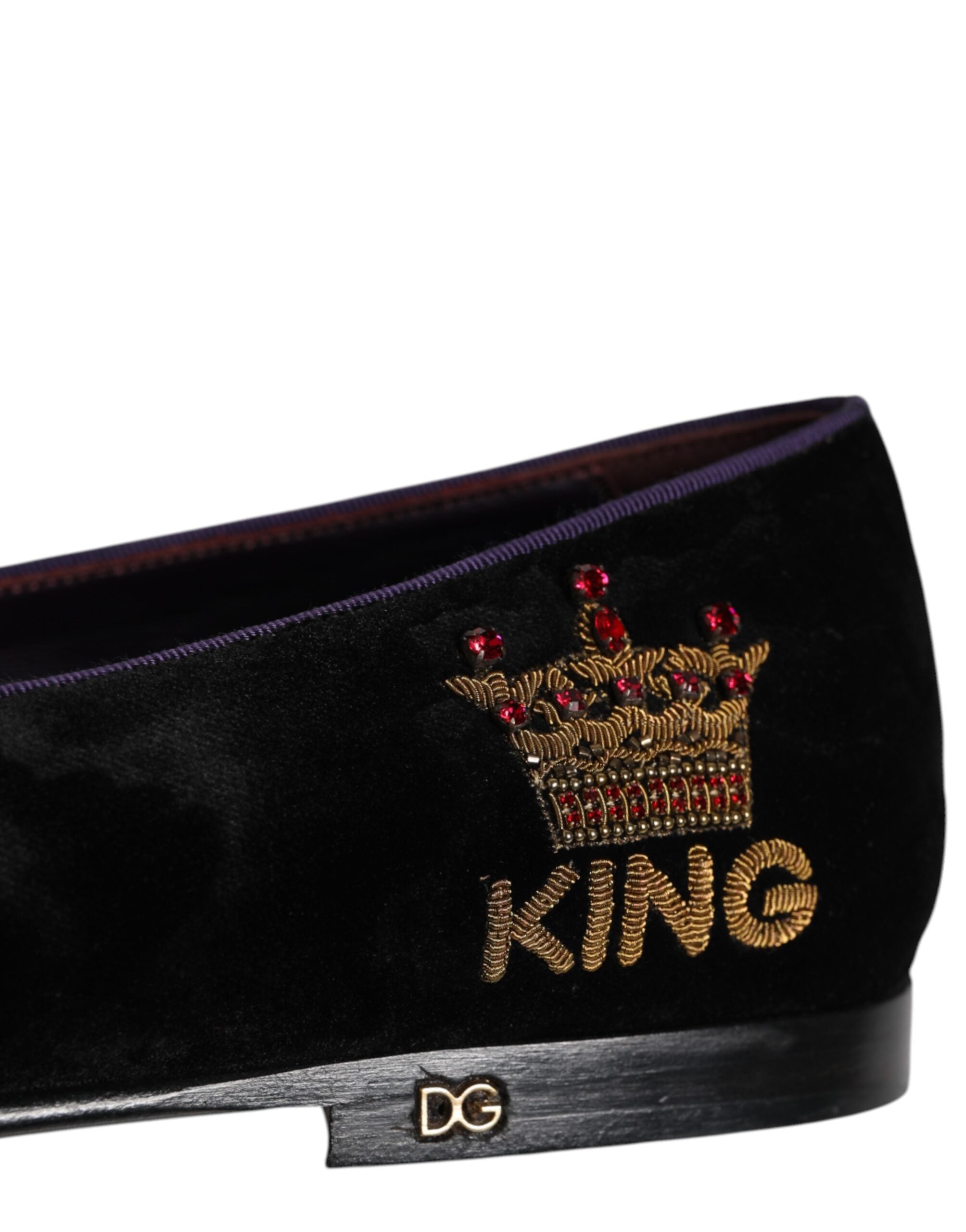 Experience the allure of Dolce & Gabbana's Black DG Crown Embroidery Loafers, where exquisite Italian craftsmanship meets timeless elegance for the discerning individual.