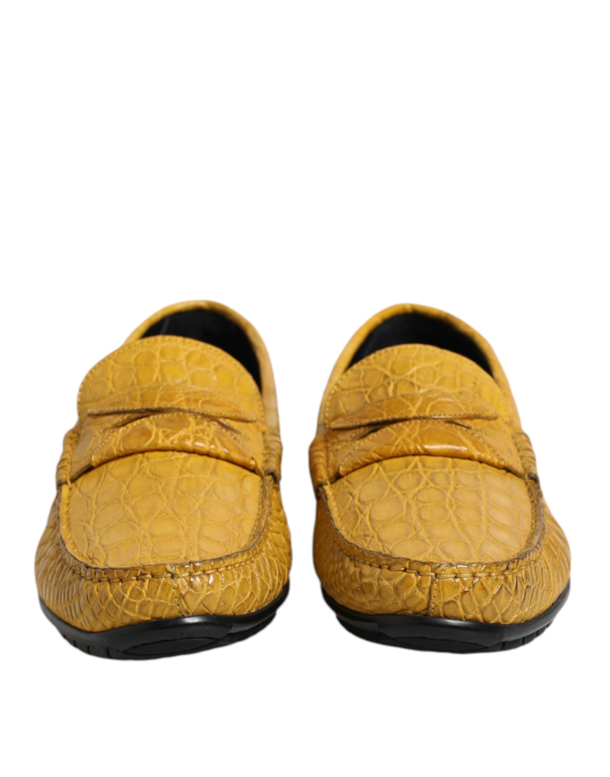 Elevate your style with Dolce & Gabbana's Yellow Exotic Leather Loafers, crafted from sumptuous Caiman leather, embodying luxury and sophistication for the discerning individual.