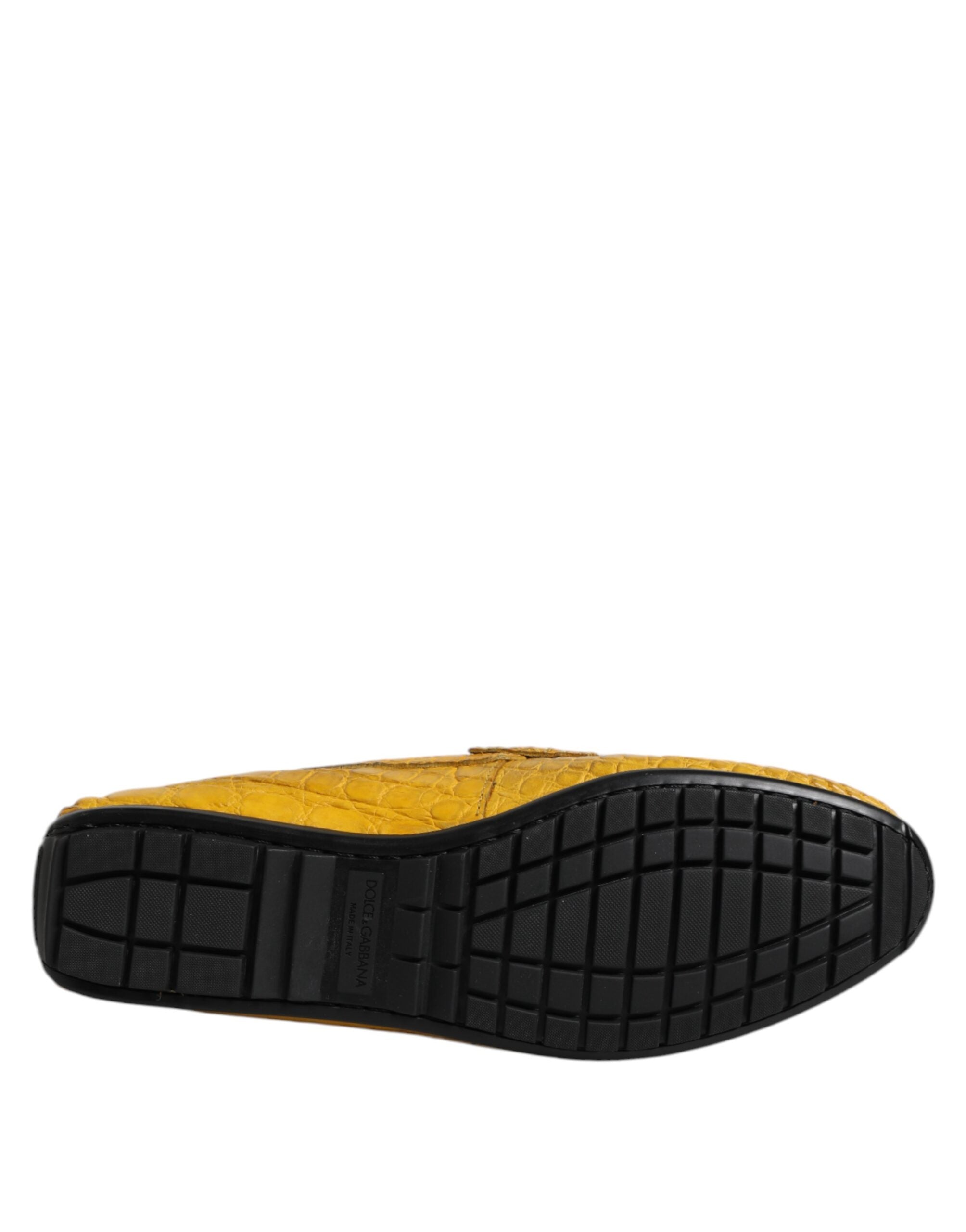 Elevate your style with Dolce & Gabbana's Yellow Exotic Leather Loafers, crafted from luxurious Caiman leather, embodying sophistication and timeless elegance.