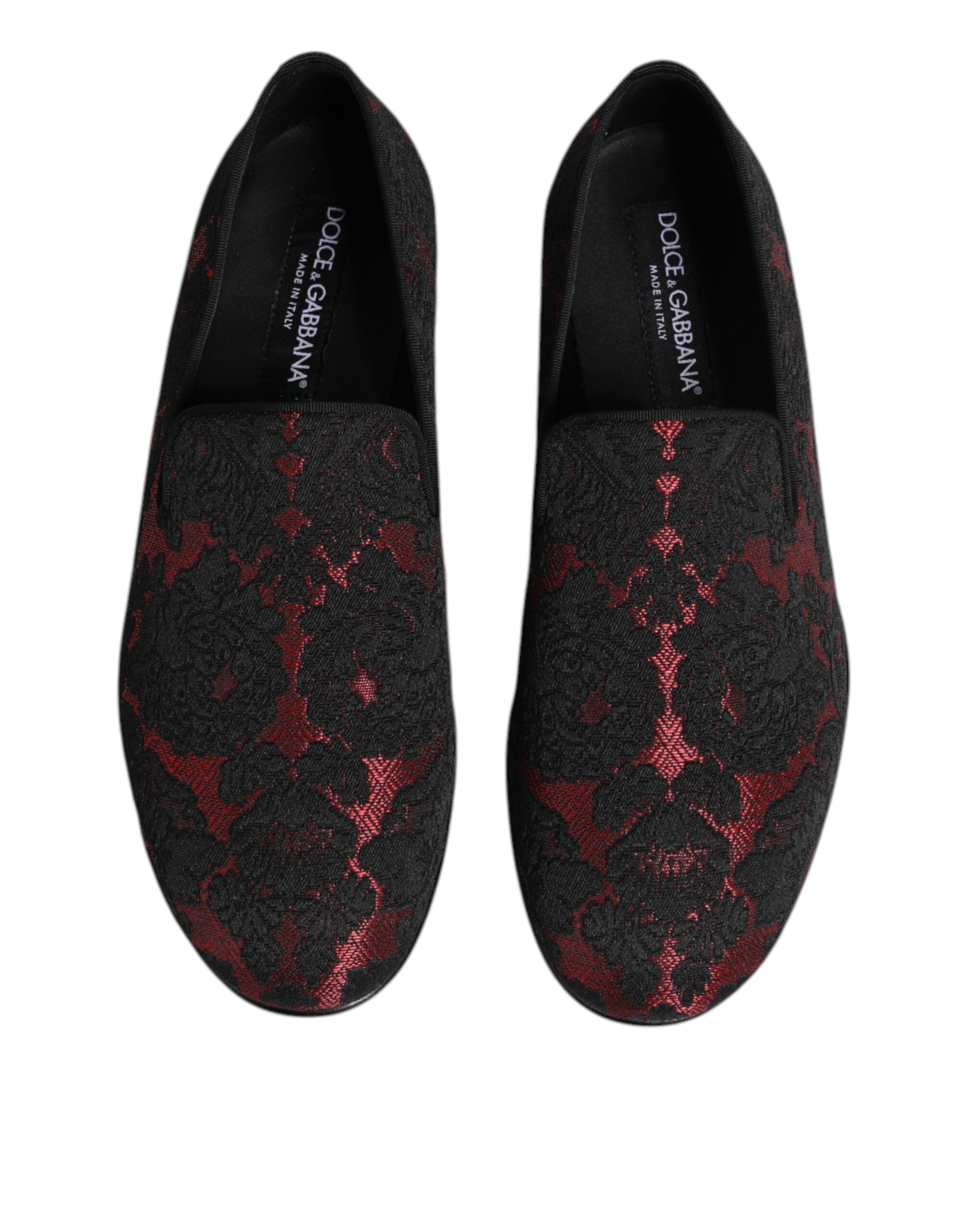 Indulge in the exquisite allure of Dolce & Gabbana's Red Black Jacquard Slip On Loafers, where luxurious leather meets intricate craftsmanship for timeless elegance.