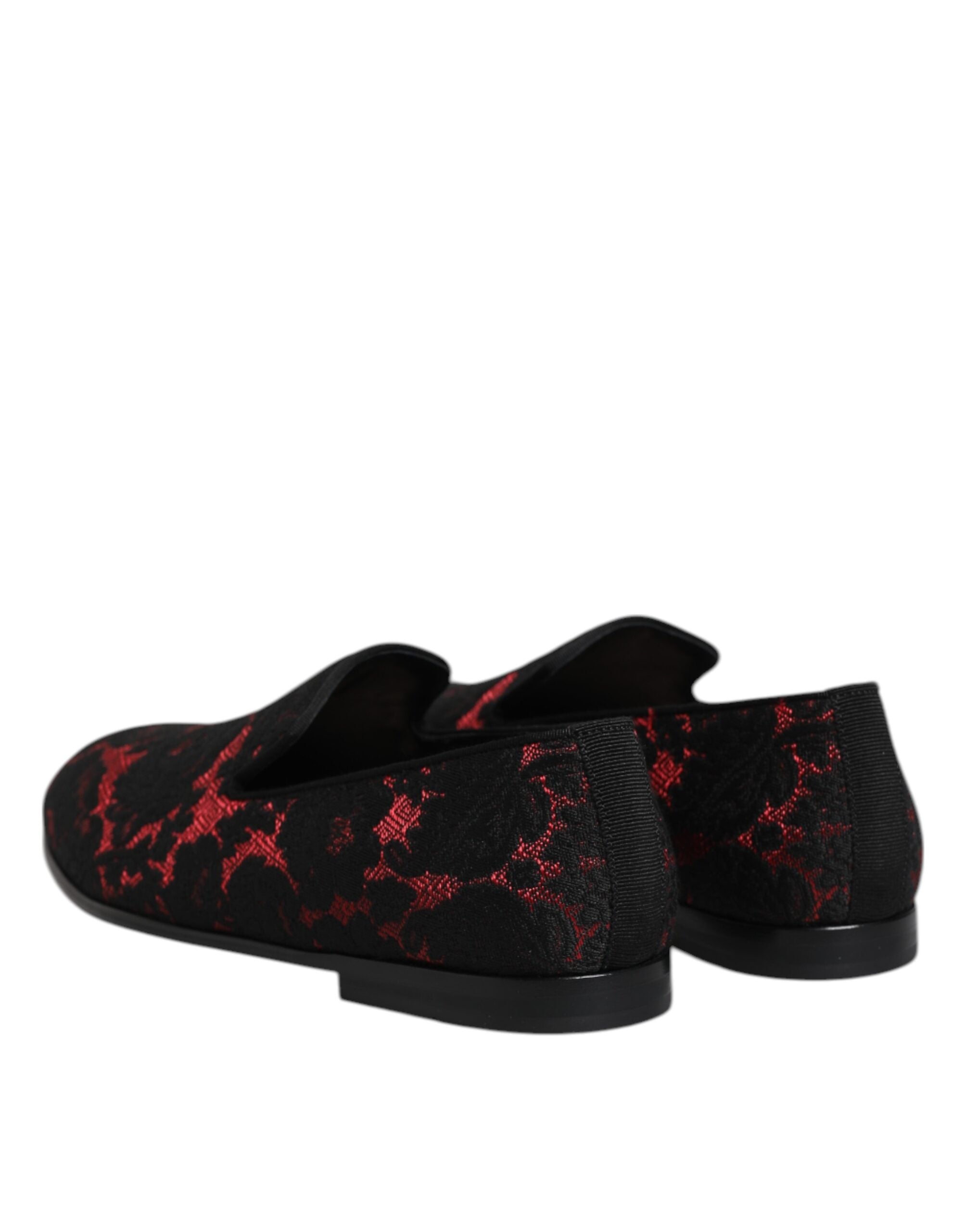 Indulge in the exquisite allure of Dolce & Gabbana's Red Black Jacquard Slip On Loafers, where luxurious leather meets intricate craftsmanship for timeless elegance.
