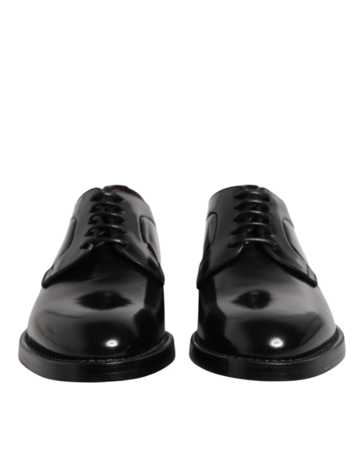Indulge in the exquisite elegance of Dolce & Gabbana Black Calf Leather Lace Up Dress Derby Shoes, where timeless craftsmanship meets sophisticated luxury for the discerning connoisseur.