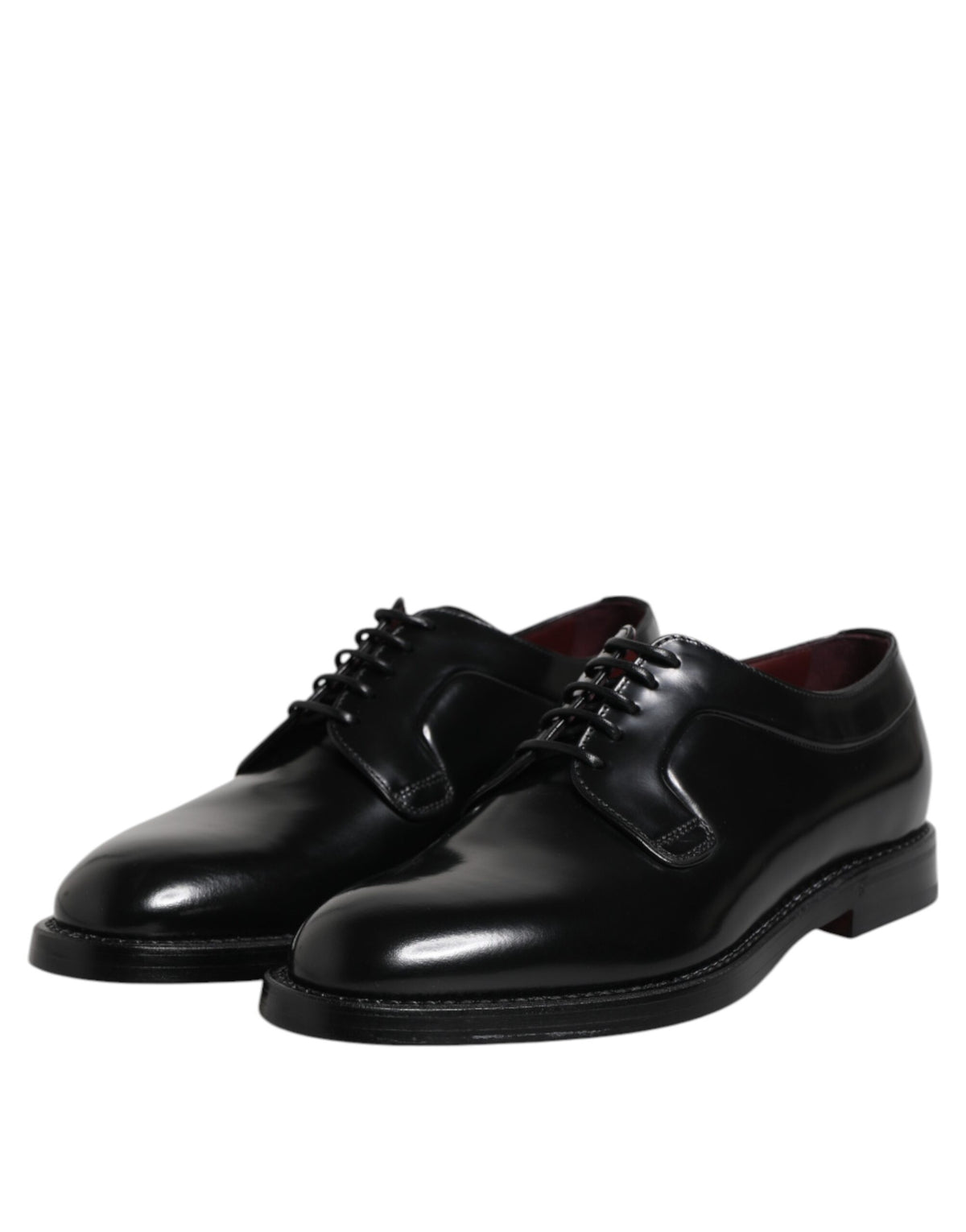 Experience the exquisite elegance of Dolce & Gabbana's Black Calf Leather Lace Up Dress Derby Shoes, where timeless craftsmanship meets luxurious sophistication for the discerning connoisseur.