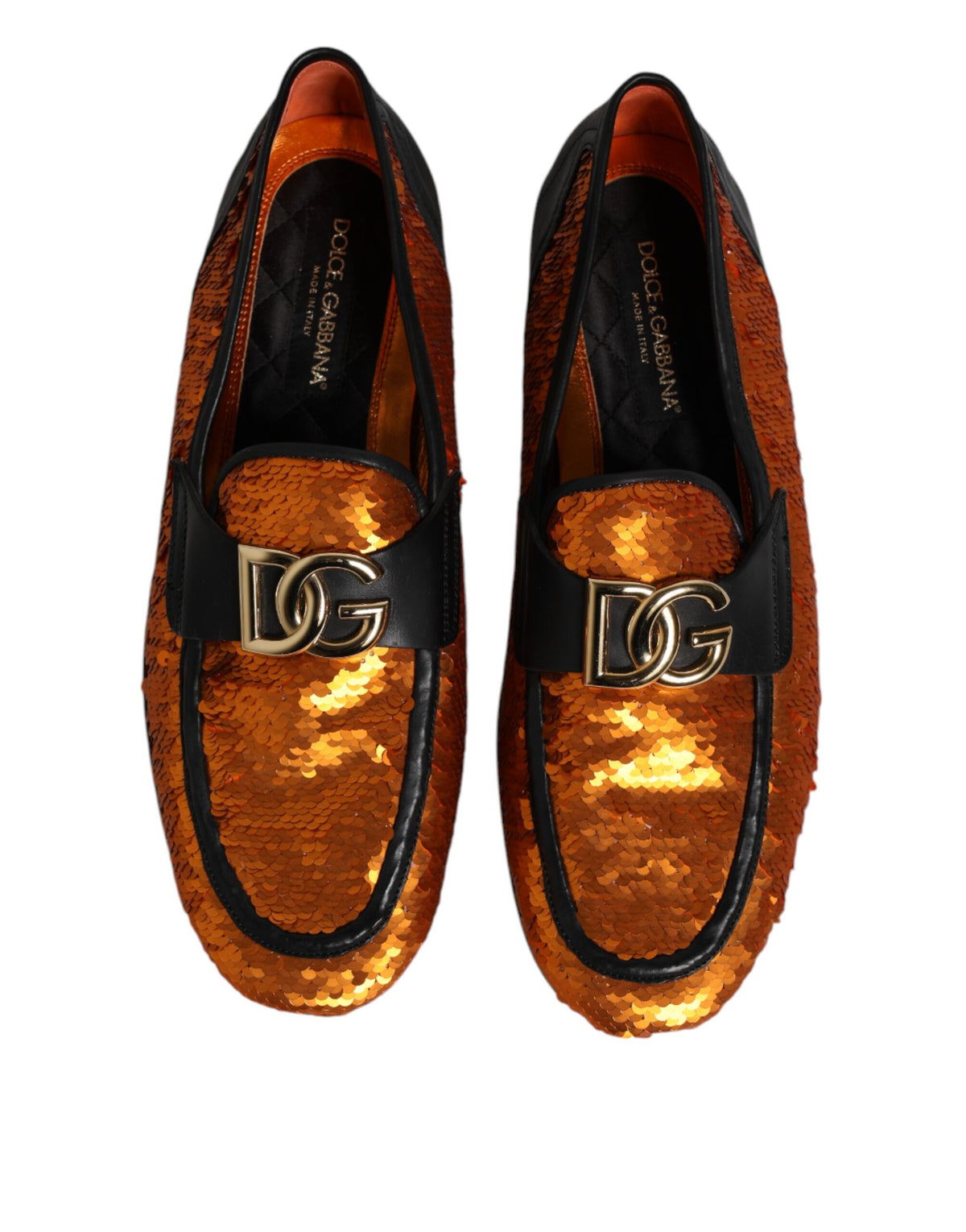 Step into the realm of luxury with Dolce & Gabbana's Orange Sequin Embellished Loafers, where exquisite craftsmanship meets bold elegance, perfect for any sophisticated occasion.