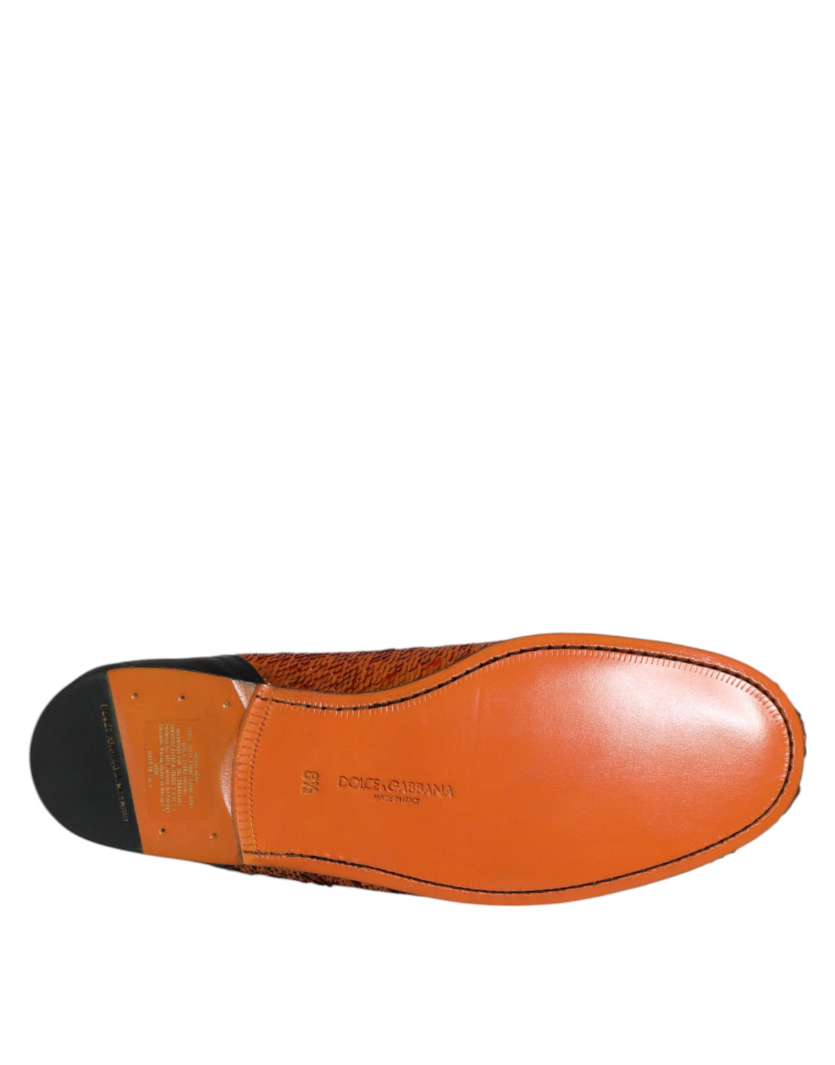 Elevate your style with Dolce & Gabbana's Orange Sequin Embellished Loafers, where exquisite craftsmanship meets luxurious materials for a bold statement of elegance.